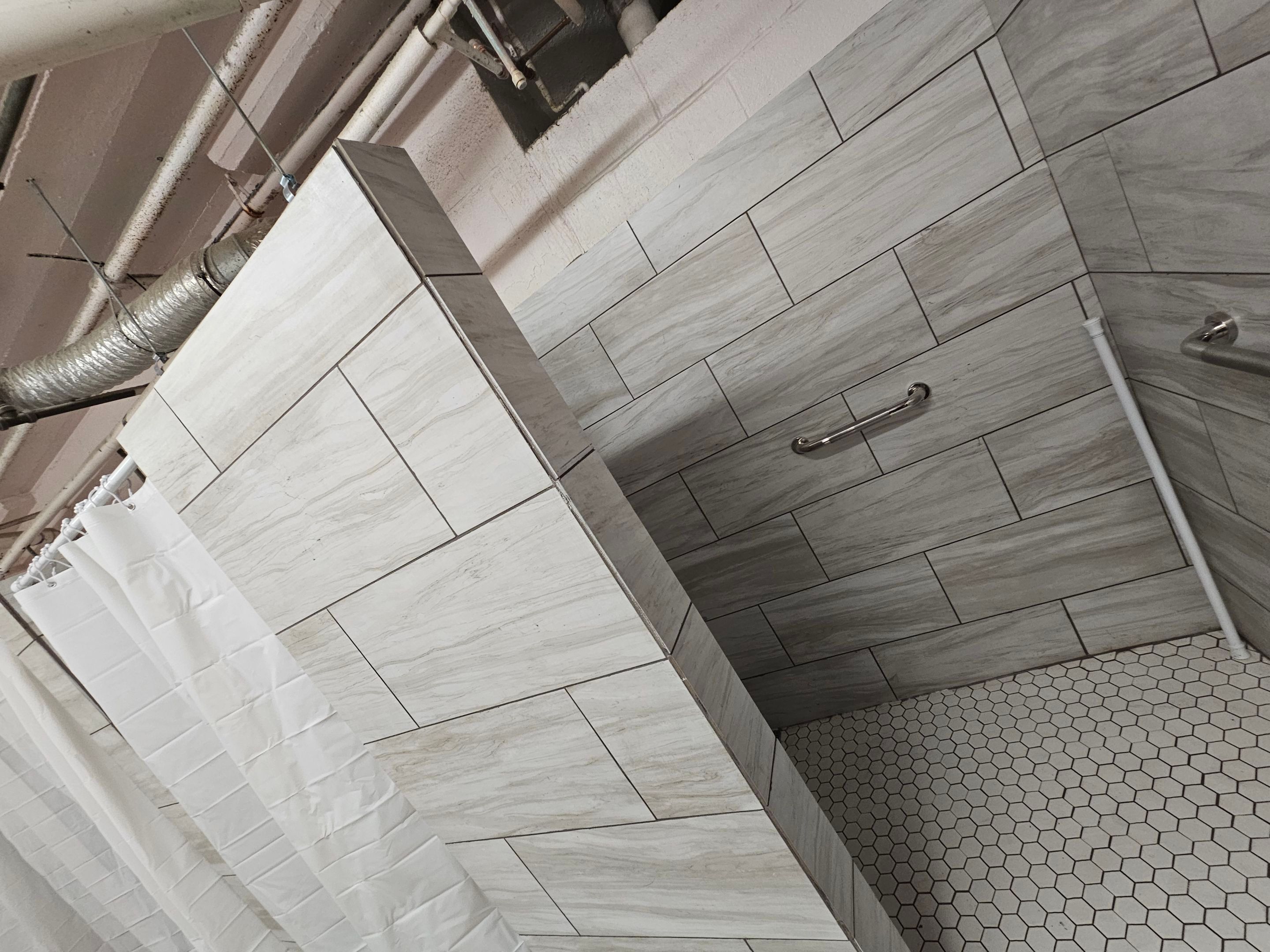 Showers & Storage by EL-GC LLC