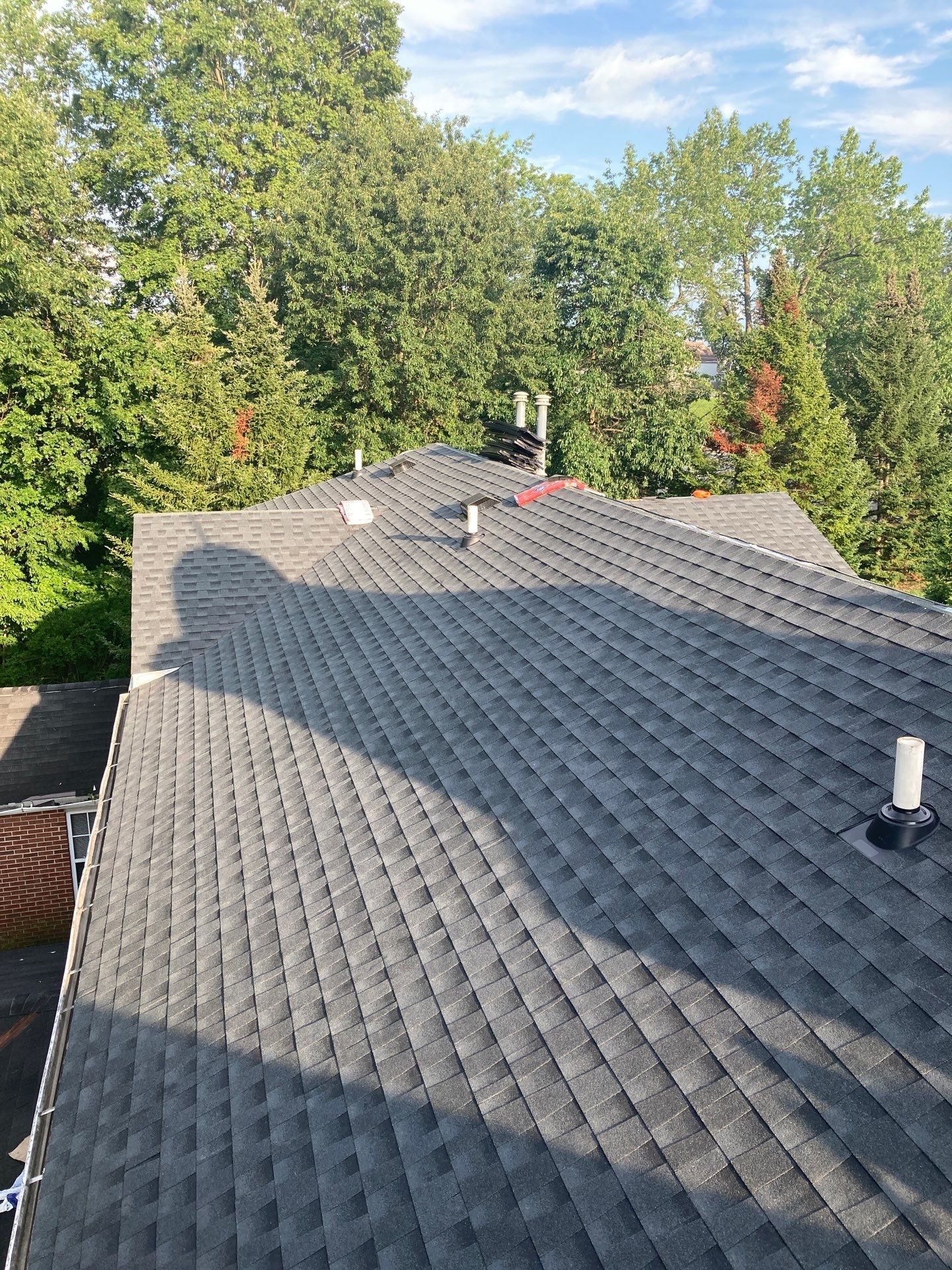Commercial Roofing Installation using GAF Timberline HDZ Charcoal by Rainstoppers Roofing