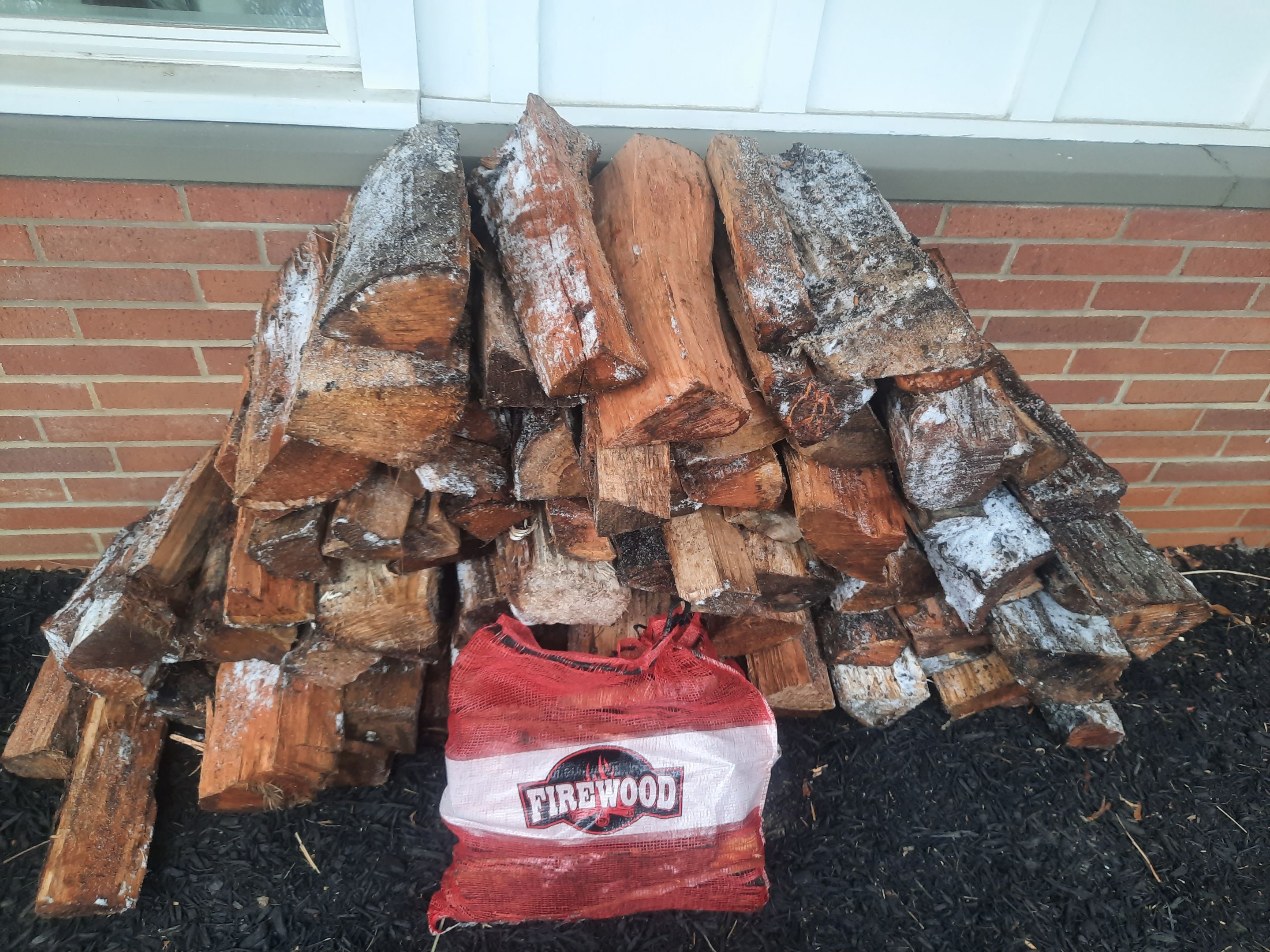 Firewood Delivery  using Seasoned Firewood by Mike Jones & Sons Tree Service LLC 