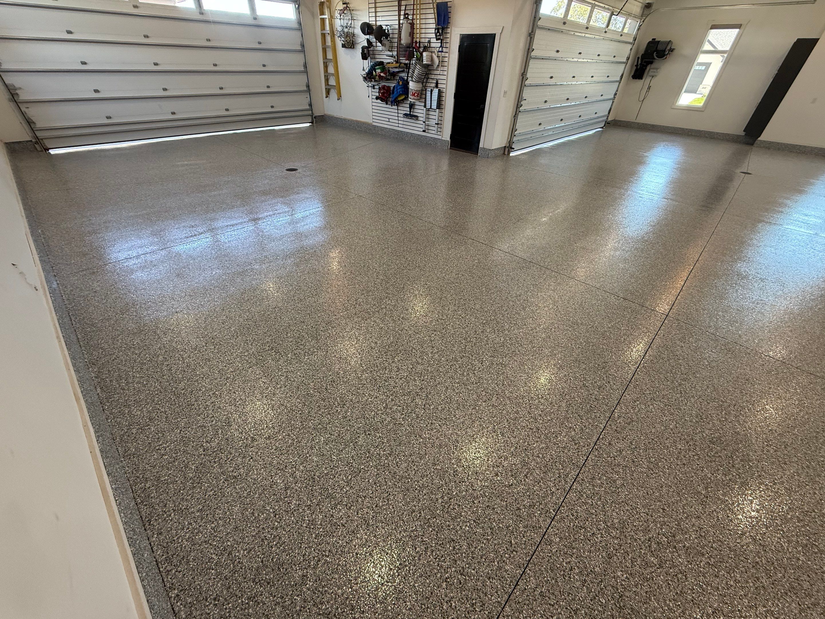 Gravel Flake Garage Floor Coating in Yankton by Select Painting, Coatings & Garage Cabinets