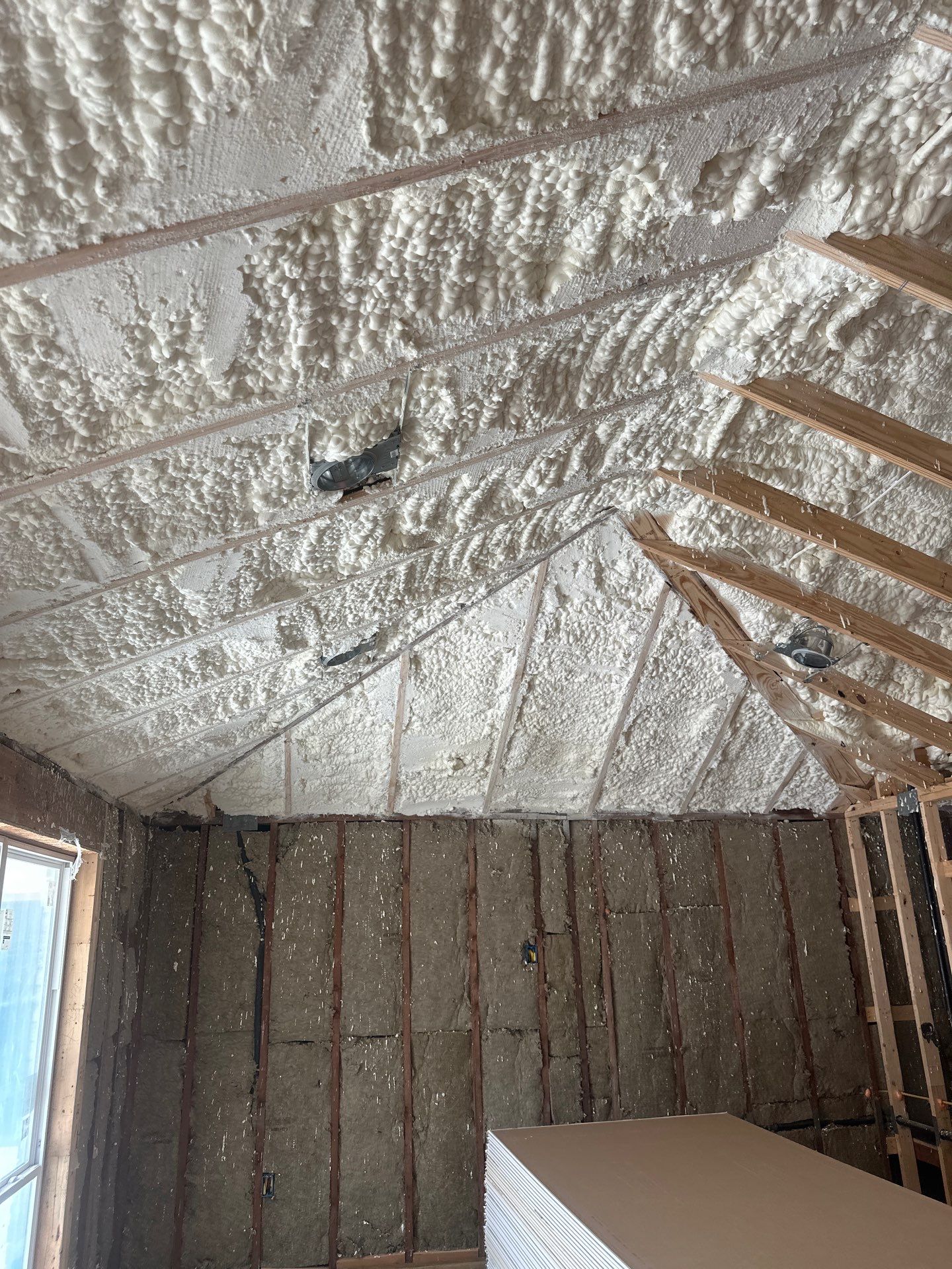 Open cell spray foam & rockwool job completed in Dallas TX by Apex Insulation Solutions
