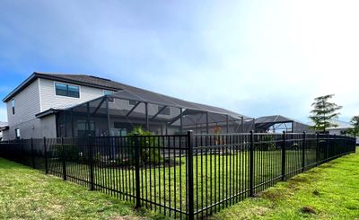 Aluminum Fence Installation using Black 3 Rail Aluminum Fence