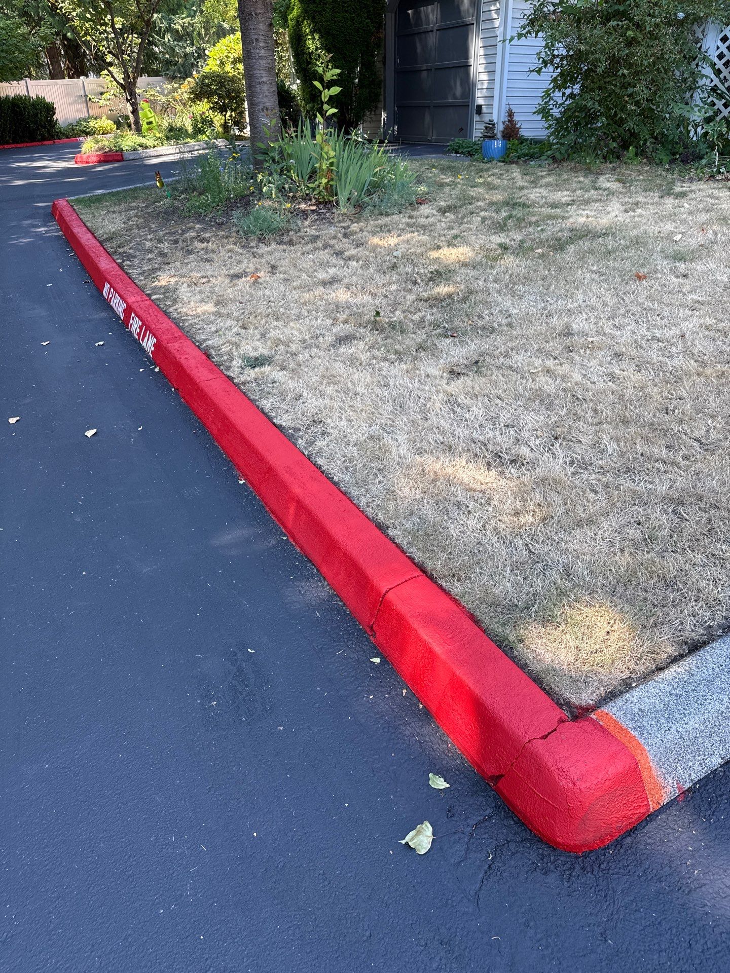Curb Repaint | Seattle  by Jireh Asphalt & Concrete Inc 
