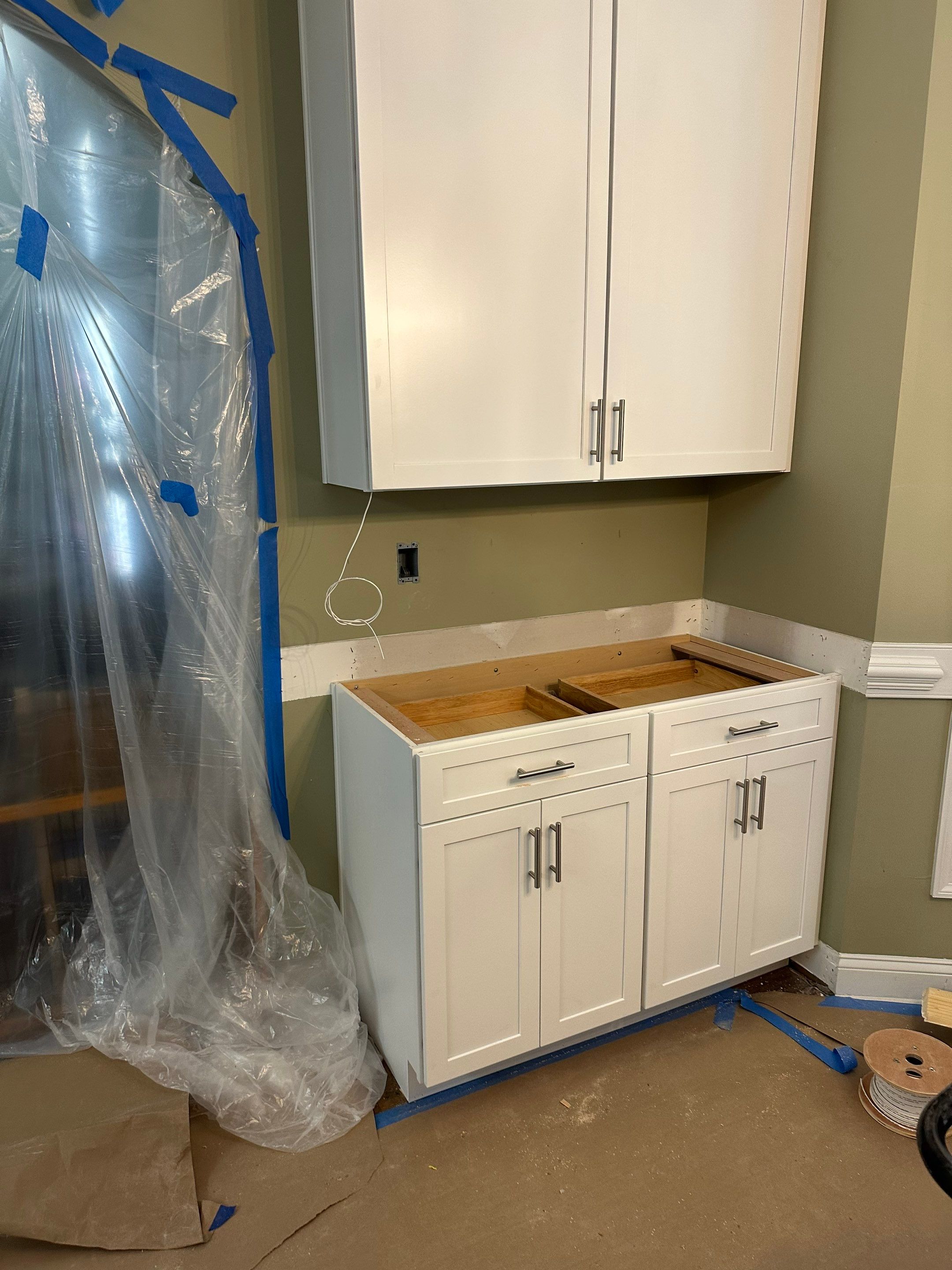 Complete Kitchen Renovation Featuring White Shaker Cabinetry in Fayetteville by Karcher Roofing & Construction
