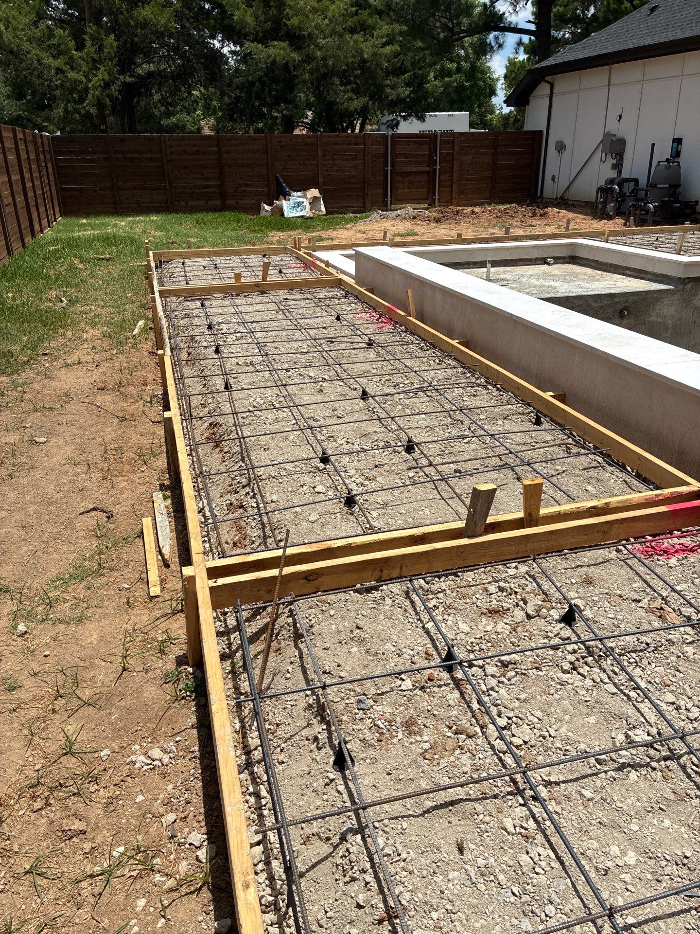 Modern Geometric Pool with Integrated Spa and Turf-Inlaid Decking by Pinnacle Pools and Spas - DFW