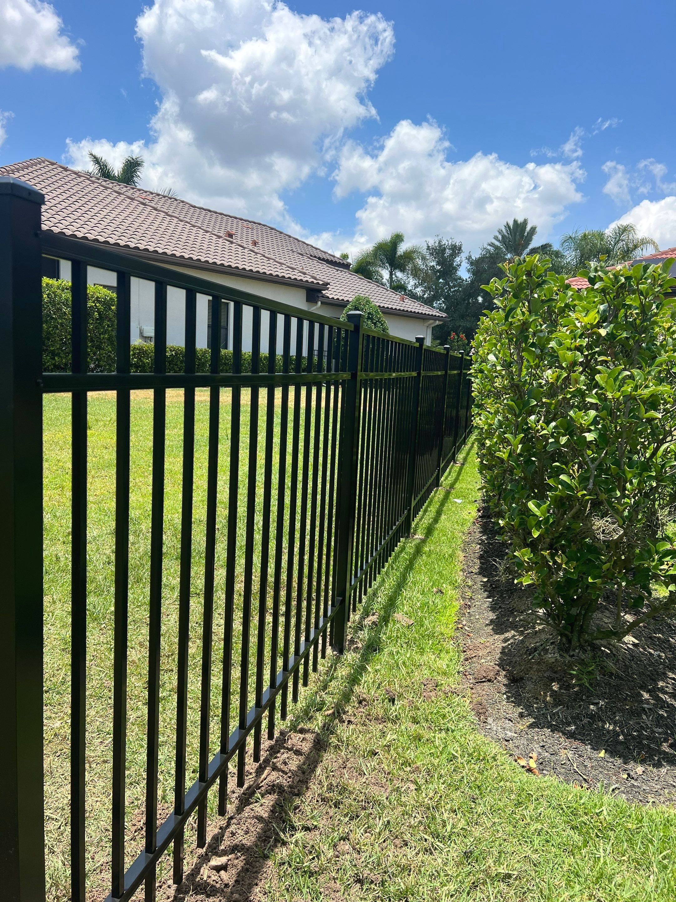 Aluminum Fence Installation using Black 3 Rail Aluminum Fence by Asap fence and gates, LLC