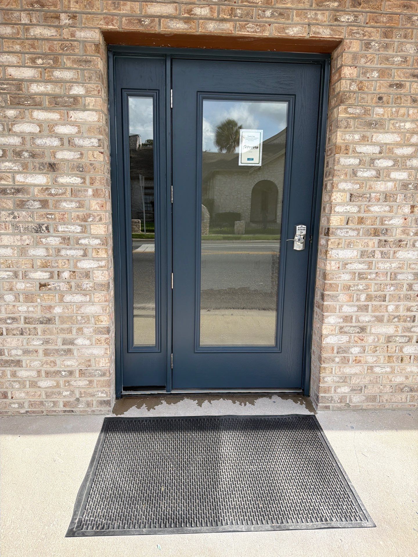 Commercial Entry Door Upgrade with ProVia Sidelight in Newberry by Windows & Doors Store