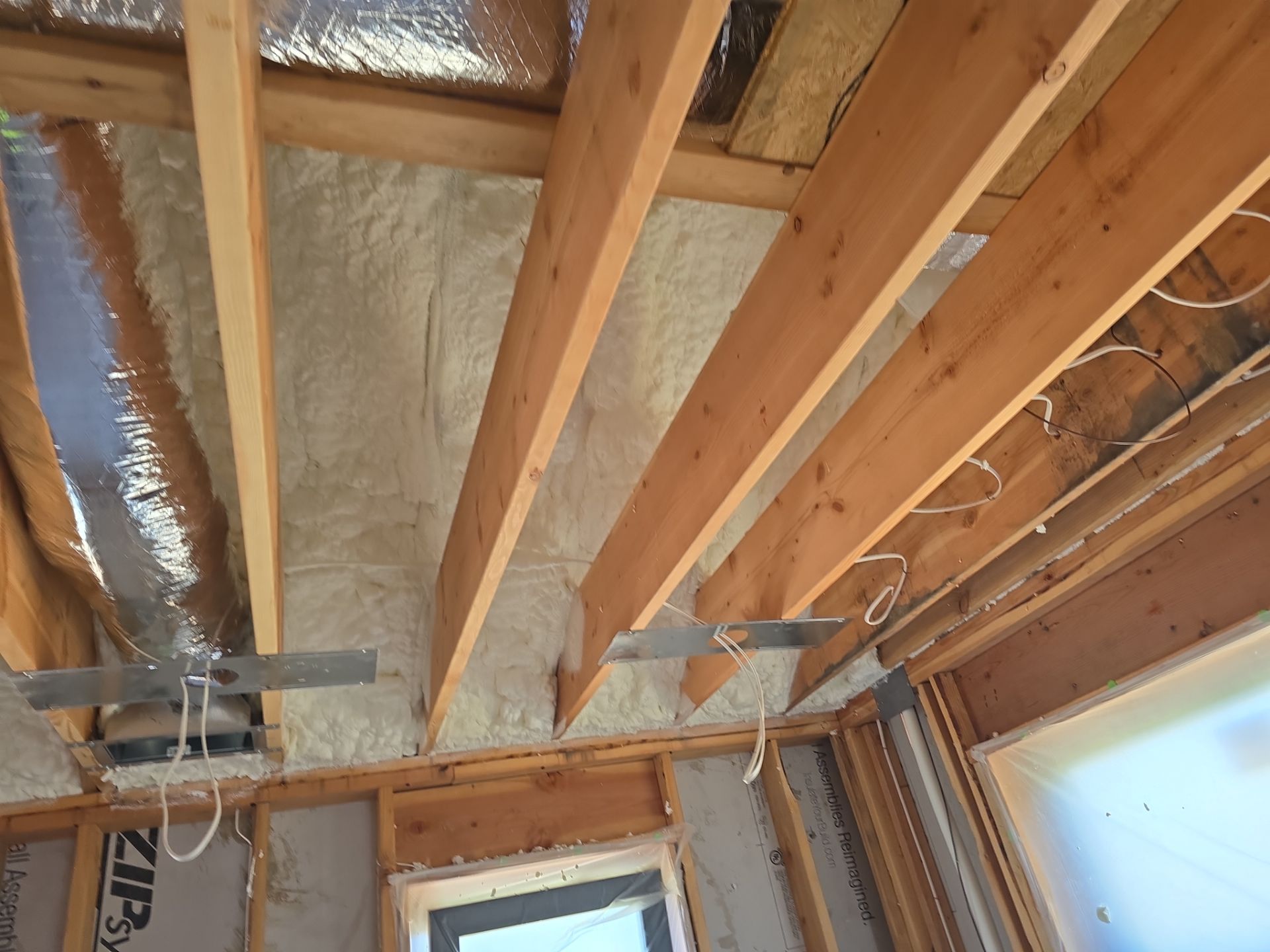 New Home Construction using open cell spray foam by NYS Foam & Energy