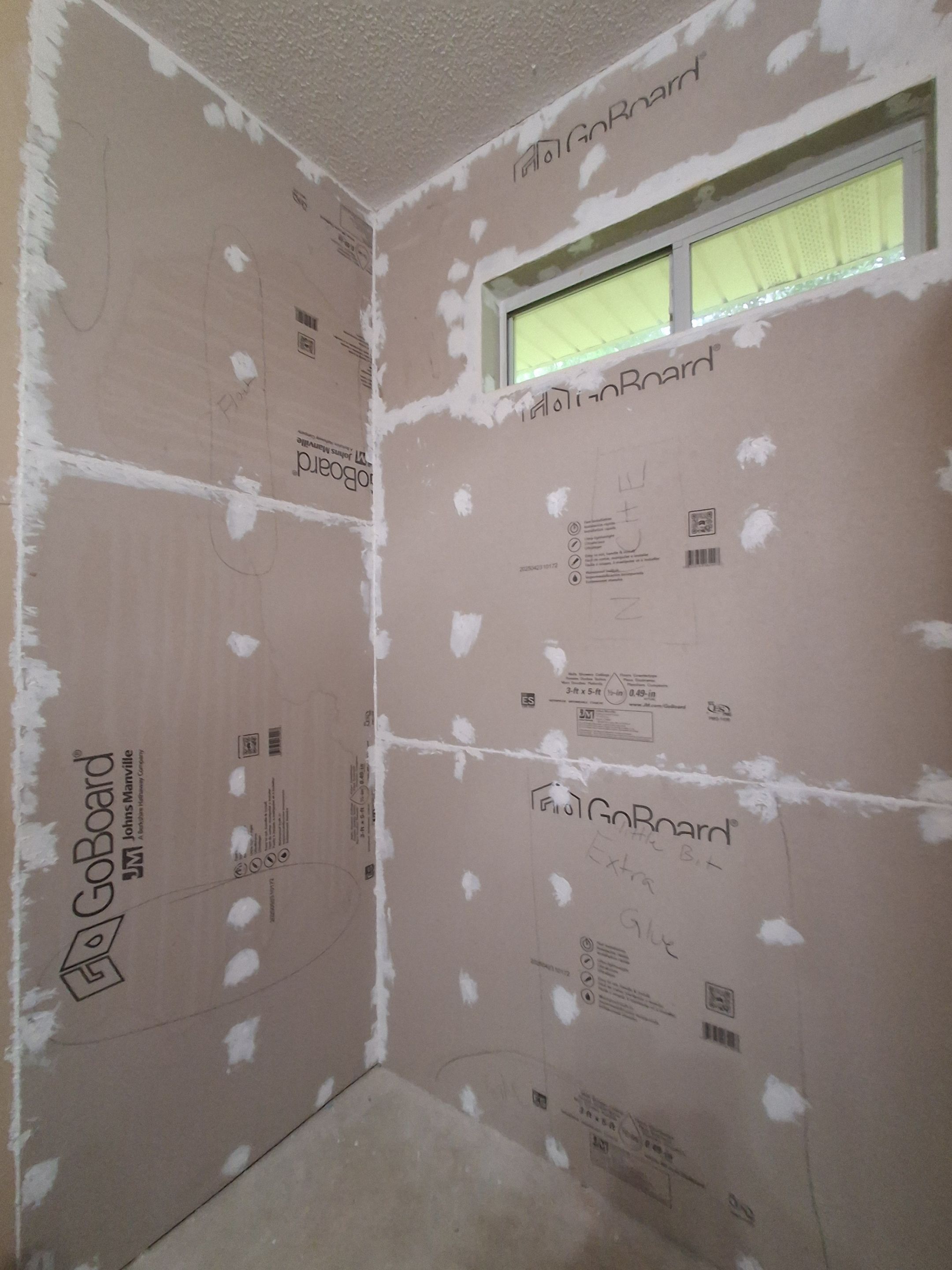 Sentrel Shower with window and ADA chair / ADA grab bar by Academy Construction