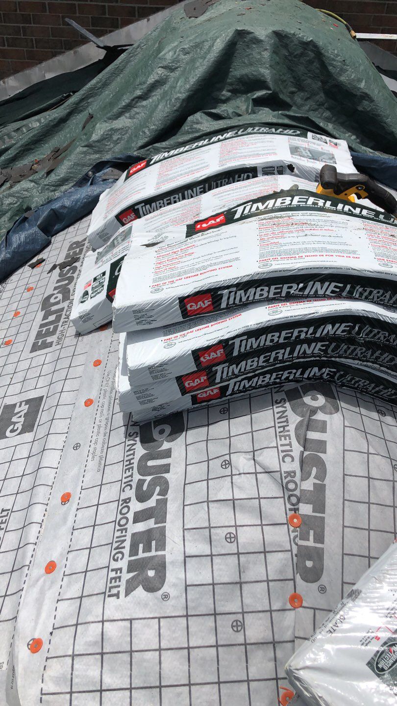 Residential Roofing Installation using Roof Replacement by American Roofing & Construction LLC