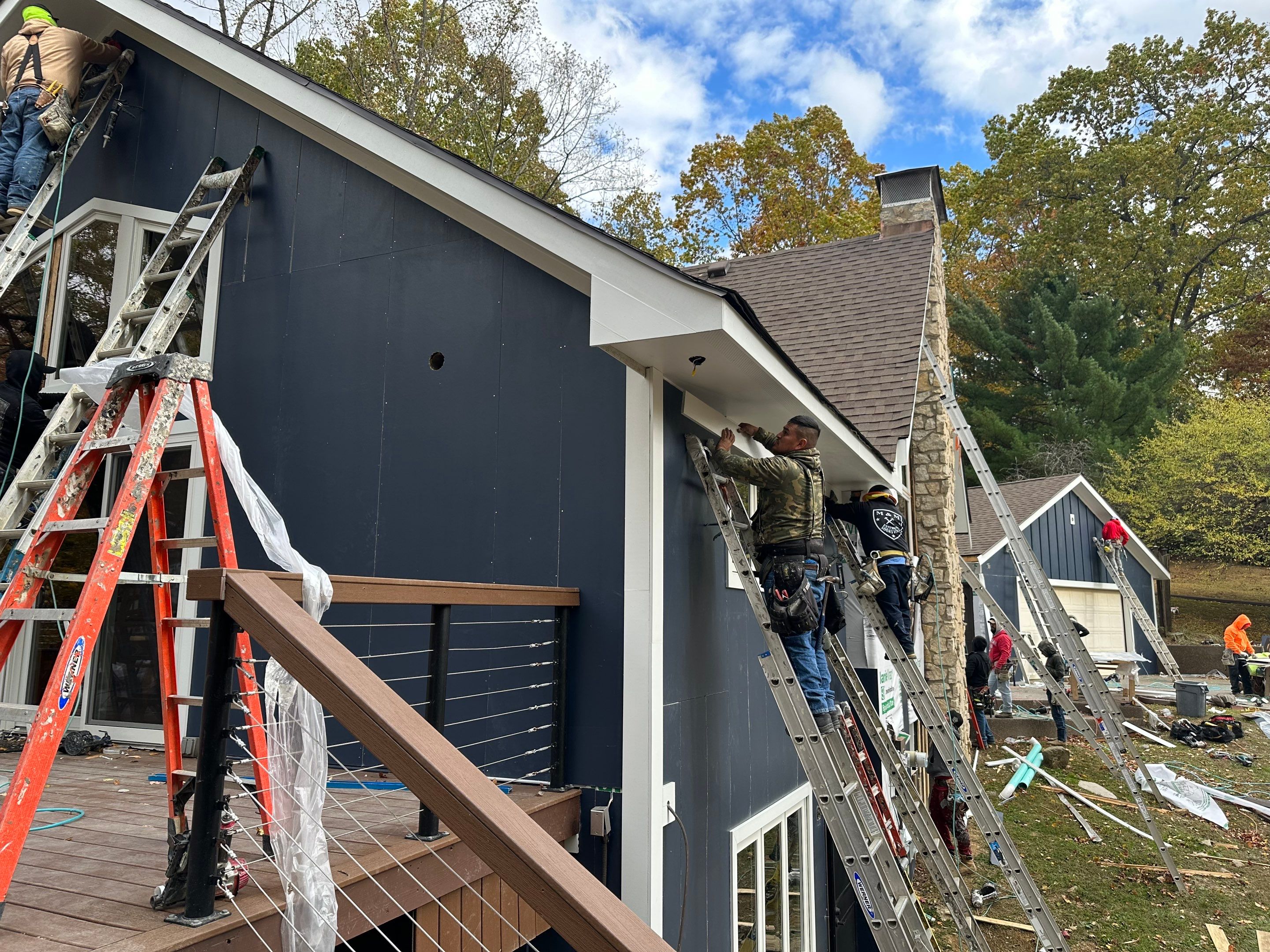 Siding Installation using James Hardie Board & Batten Siding by Best Roofing & Siding Company