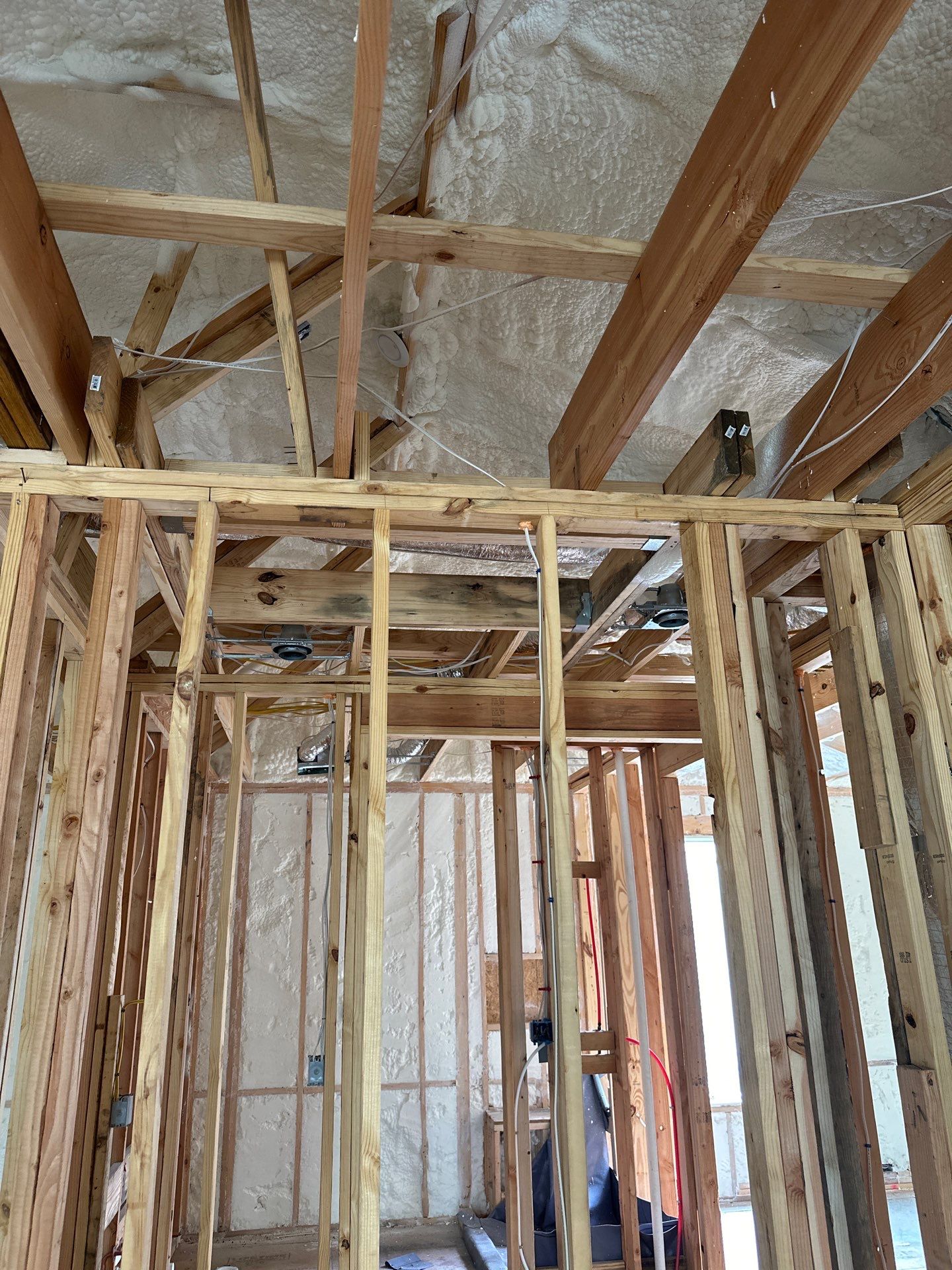 Open cell spray foam job completed at this beautiful custom home in Dallas TX by Apex Insulation Solutions