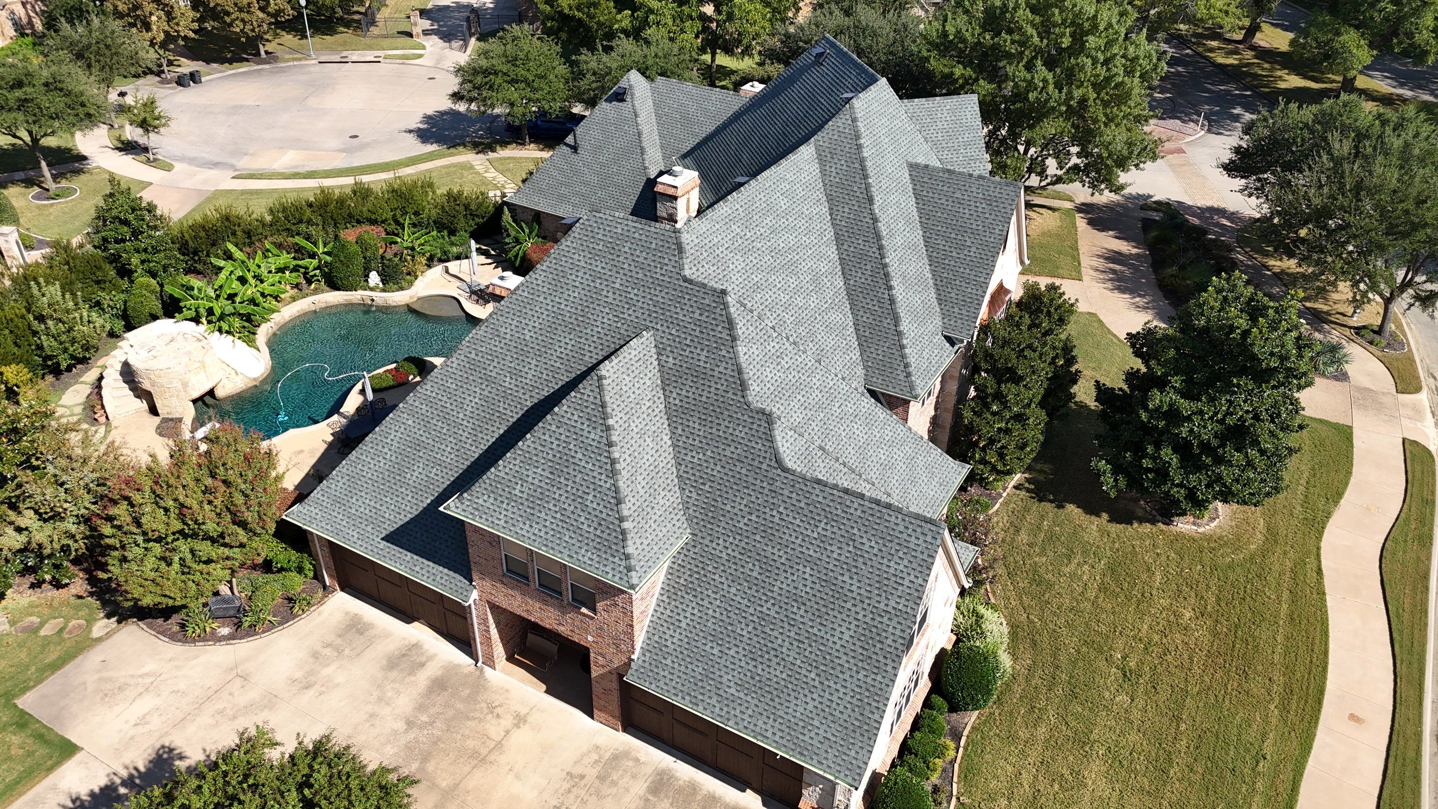 Southlake Texas Estate - Roof, Copper Awning and Gutter Project by First United Roofing & Construction