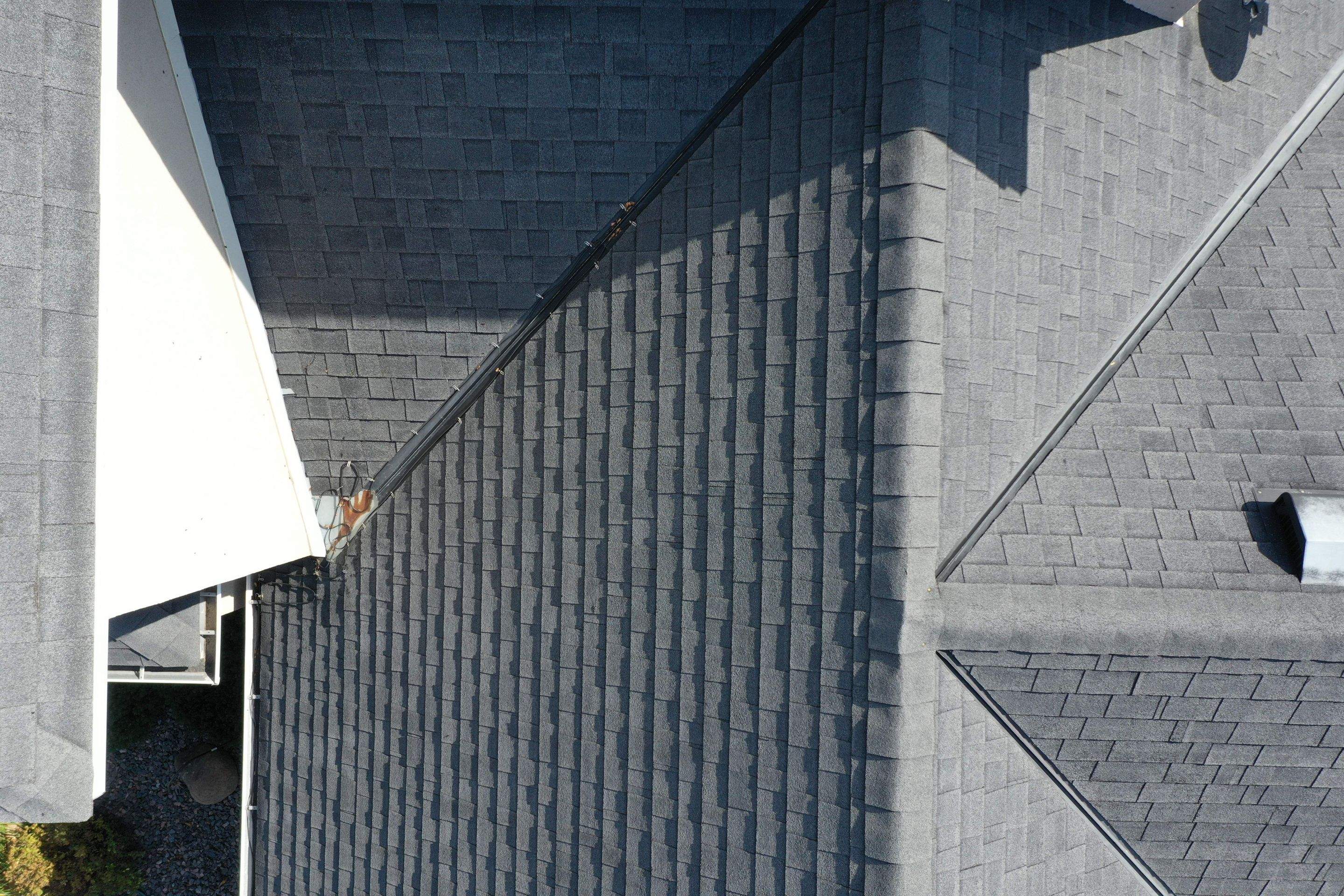 Residential Roofing Installation using Certainteed Landmark Moire Black by MODERN EXTERIOR SYSTEMS