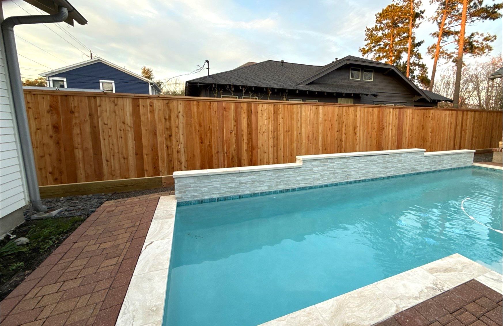 Durable Fence & Gate Installation with Premium Stain by Tim's Fences