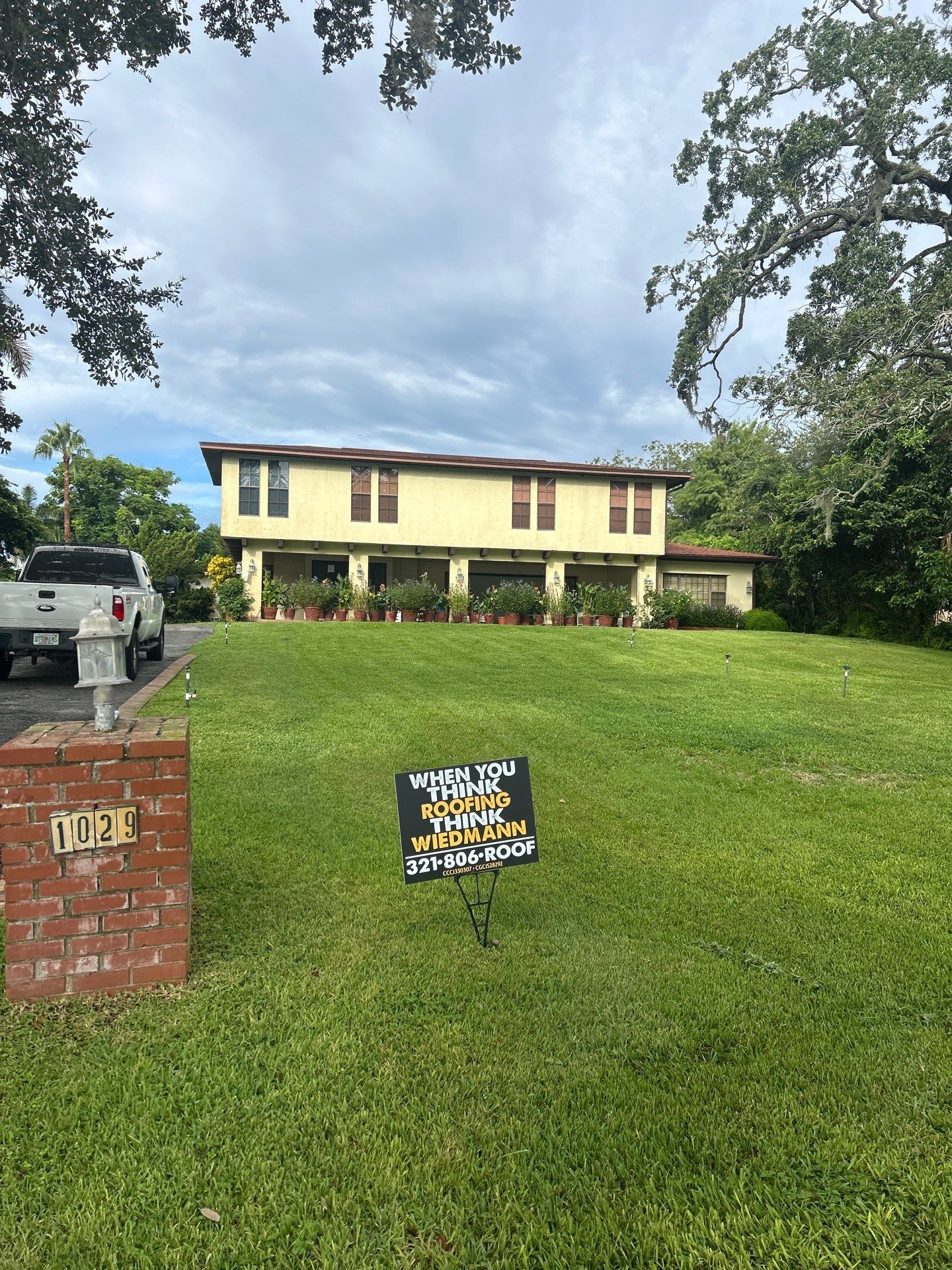 Cocoa Residential Roof Replacement Featuring Integrated Skylights and Flat Roofing by Wiedmann Construction & Roofing