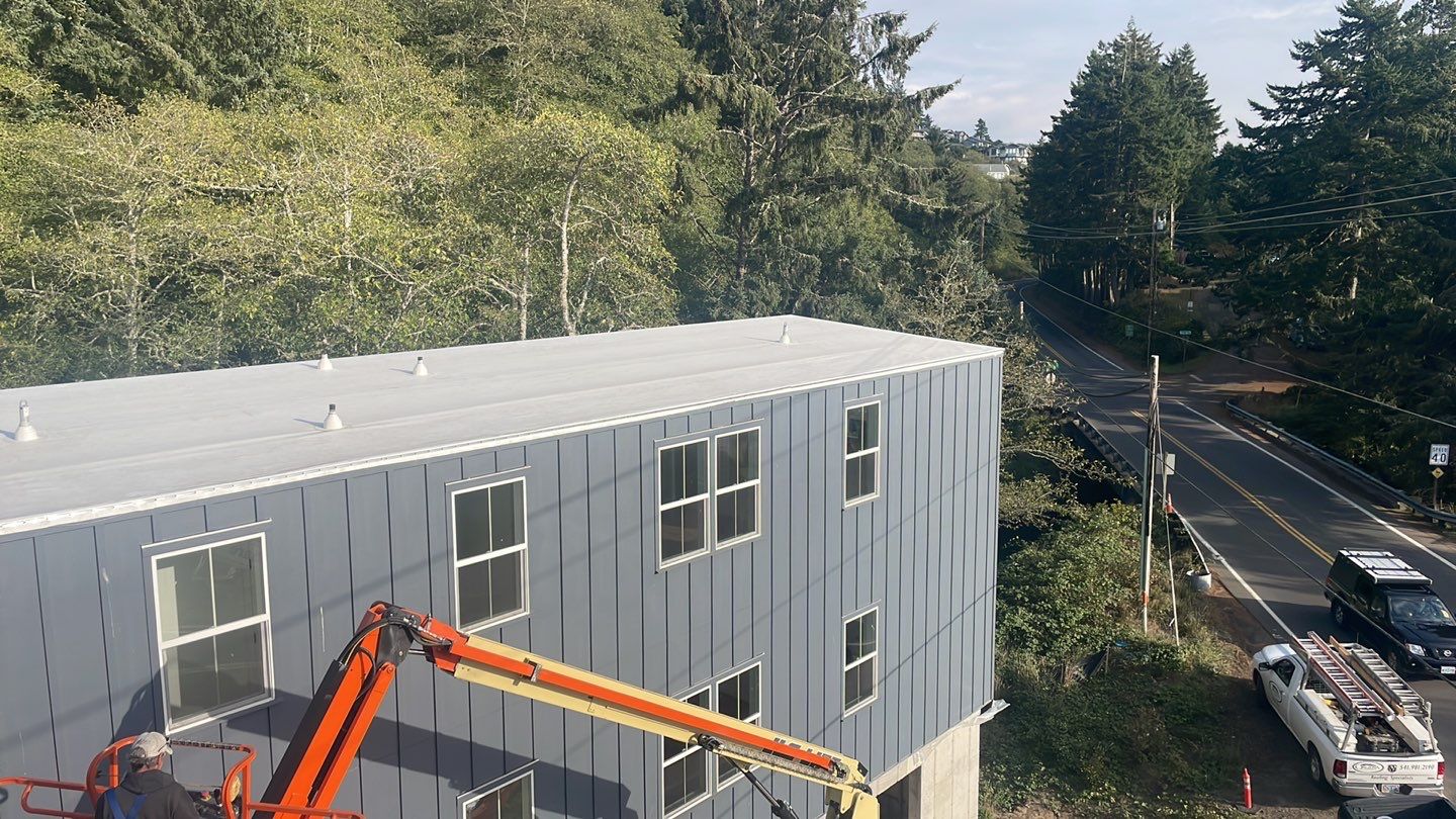 Commercial Roofing Installation using GAF 60Mil TPO  by Orezona Building & Roofing Company, Inc.