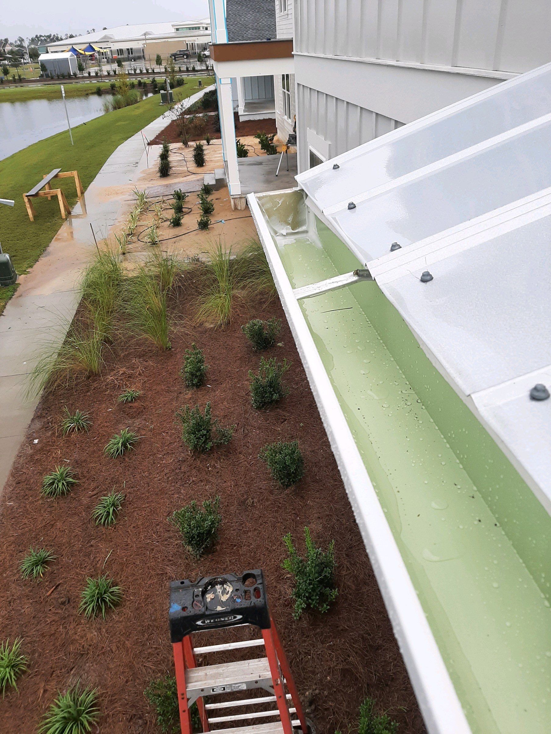 Seamless Gutter Installation using White K-Style Gutters by Gutter Professors