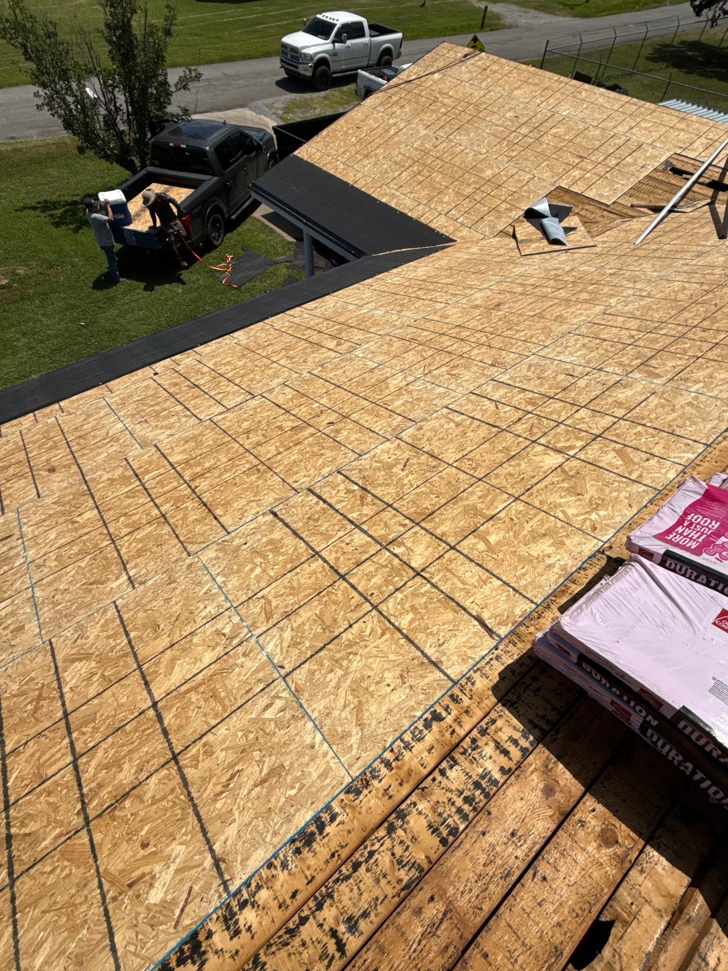 New roof & siding paid by insurance. Along with new roof sheathing.  by In & Out Construction & Remodeling, LLC