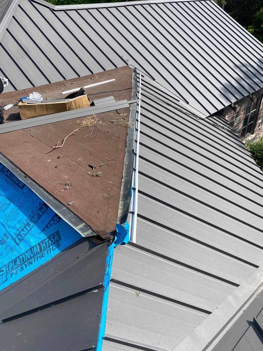 New Roof Installation using 16" Standing Seam Panels by Jay Carter Roofing & Sheet Metal
