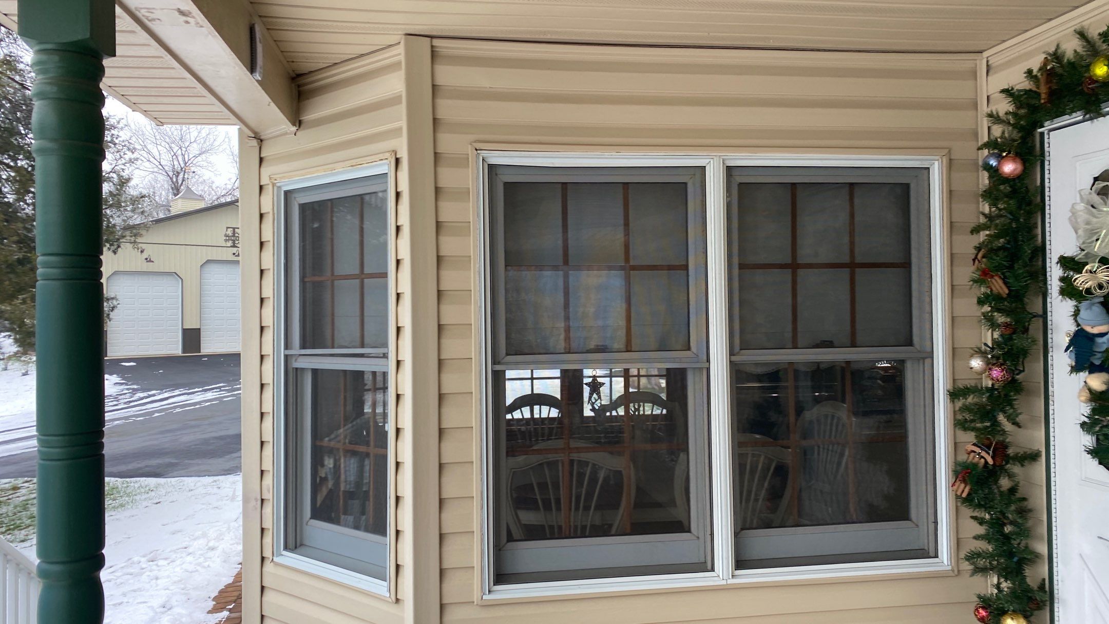 Exterior remodel including window replacement by American Home Contractors