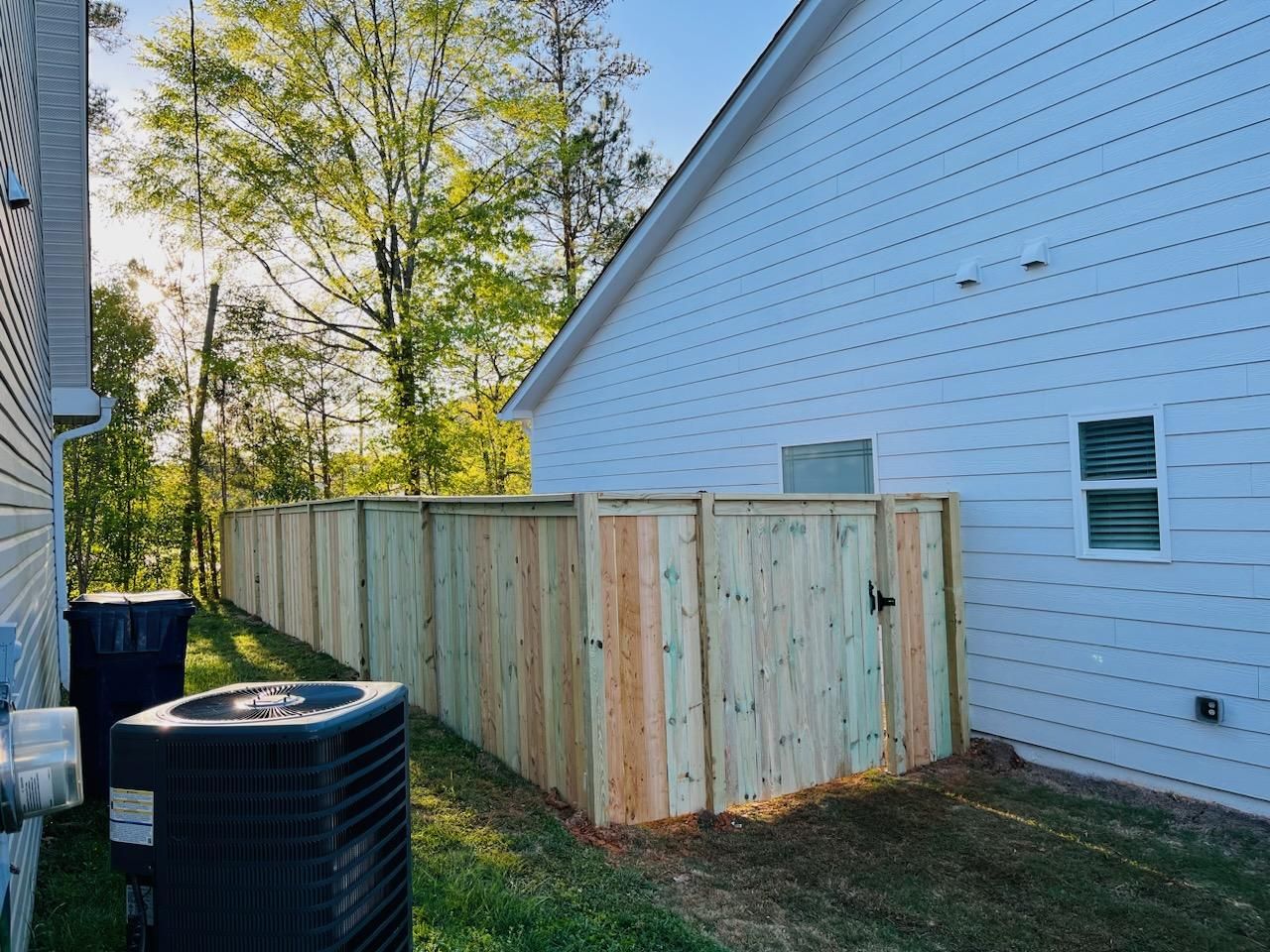 Wood Privacy with Decorative Top Cap by Titans of Timber Fence & Stain