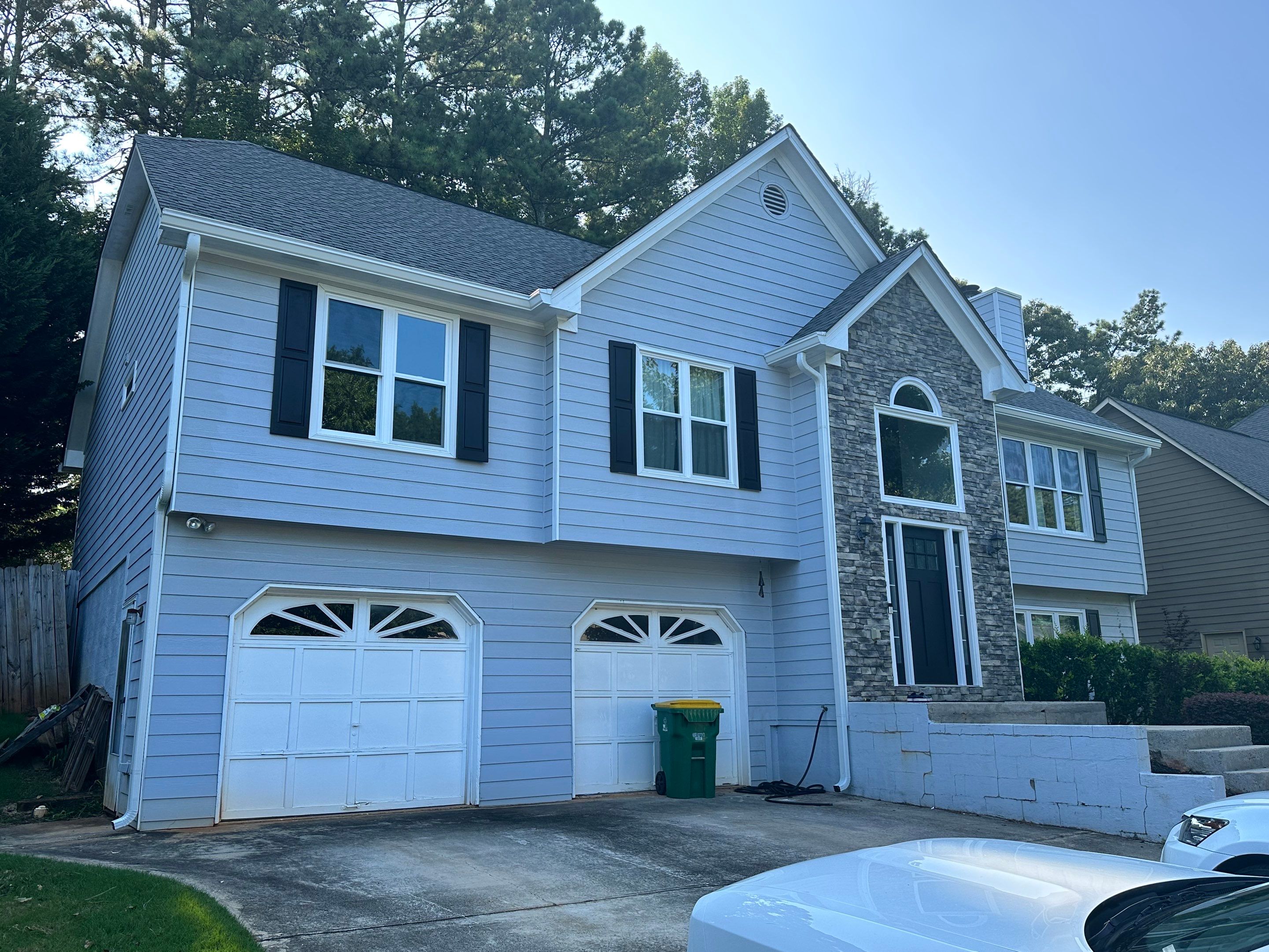 Gutter Replacement for a Two-Story Home in Woodstock by Swift Home Renovations