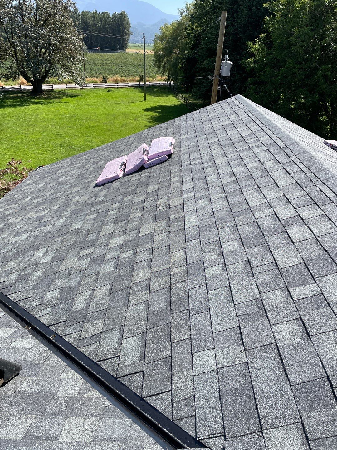 Residential Roofing Installation using OC Oakridge shingles and Duraclad Accent roof by Top Notch Roofing Inc