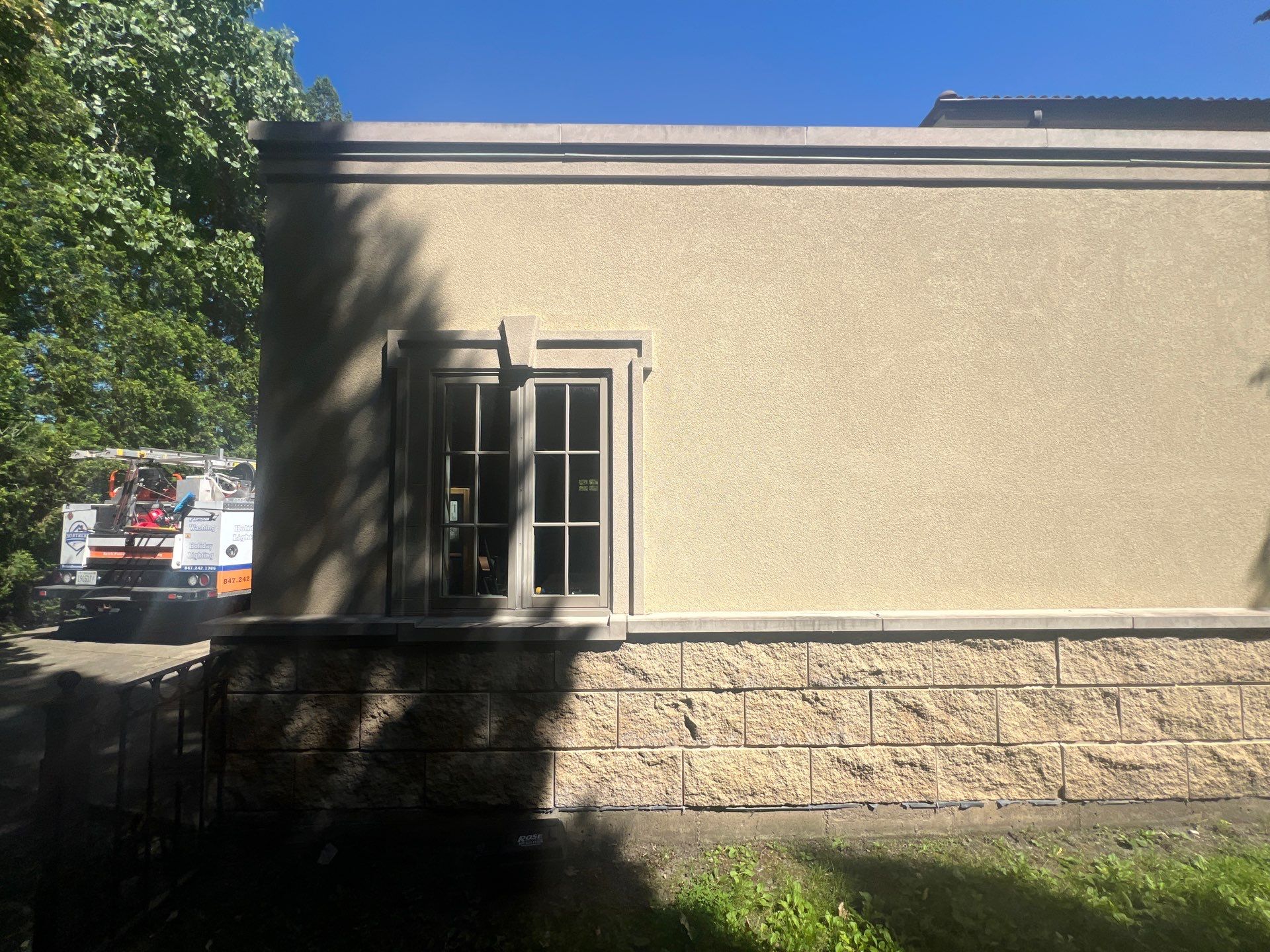 concrete cleaning using Algaecide, soft wash soap by Northern Power Washing LLC.