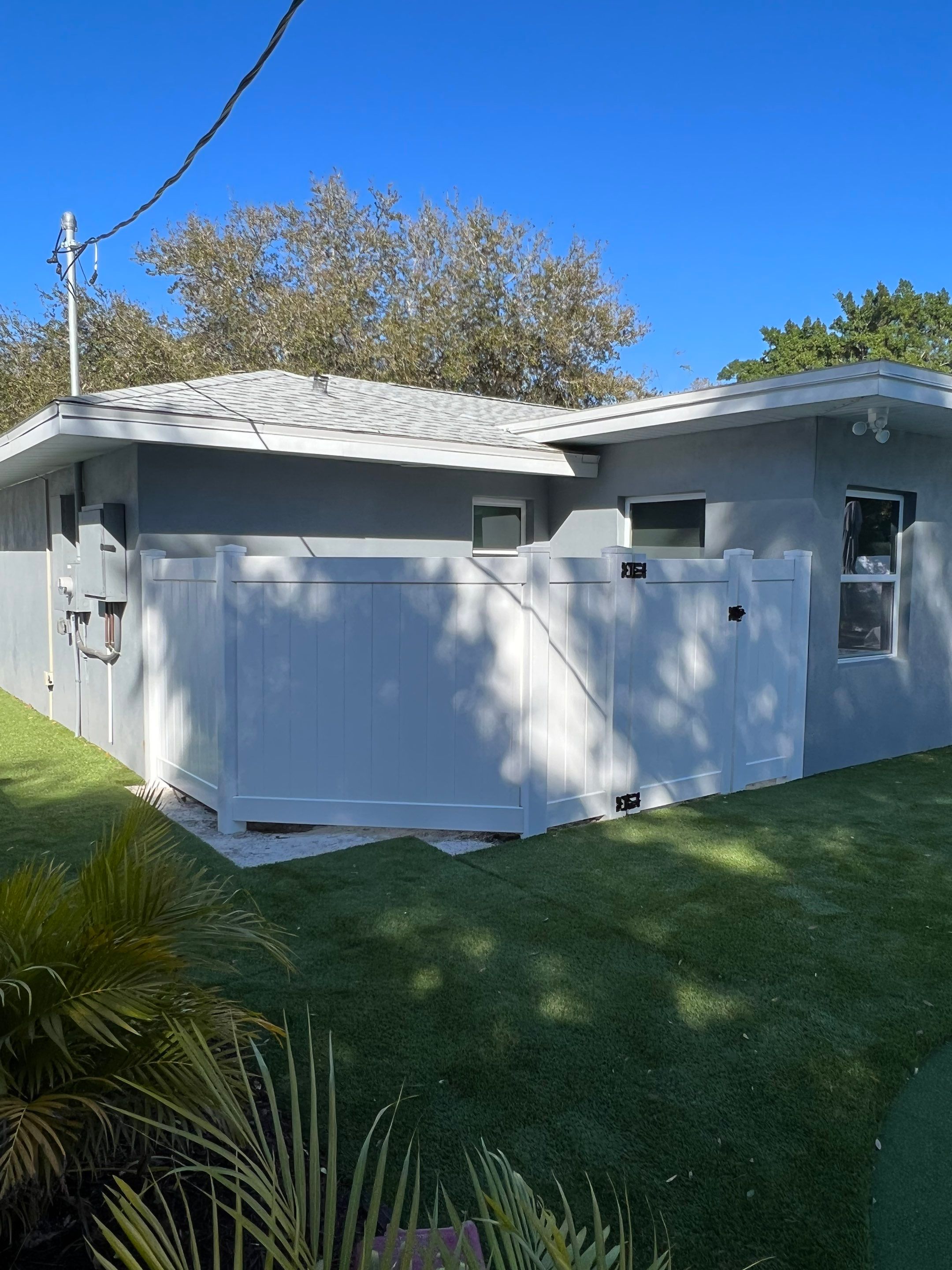 Vinyl Privacy Fence With AC Enclosure and Storage Corral by Asap fence and gates, LLC