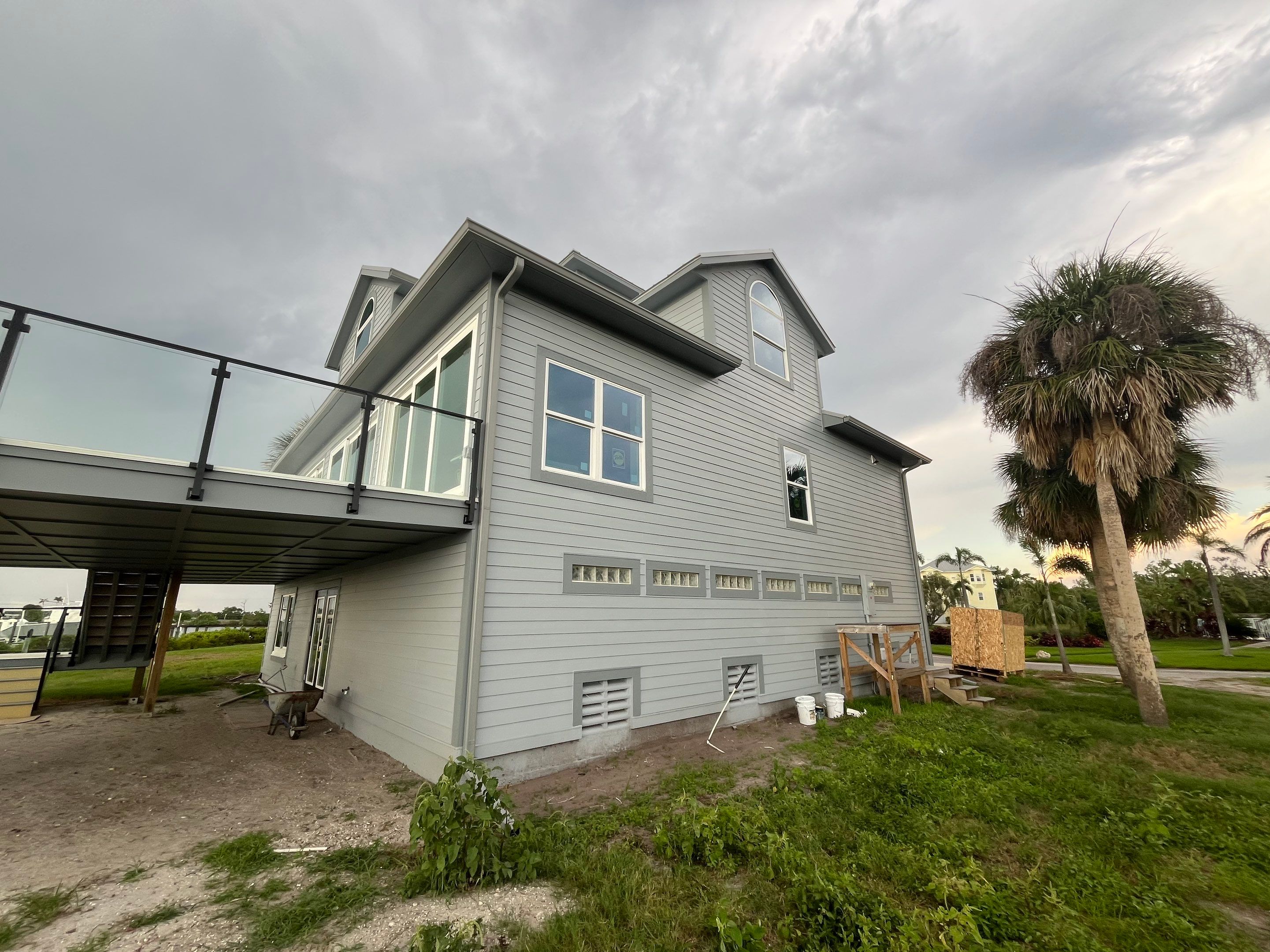 Downspout Installation Dove Grey Palmetto FL by Gutter Professors
