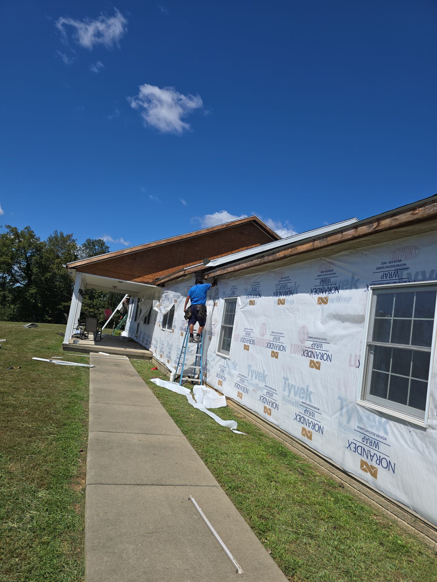 Residential Roofing Installation using GAF Timberline HDZ Charcoal by Rainstoppers Roofing