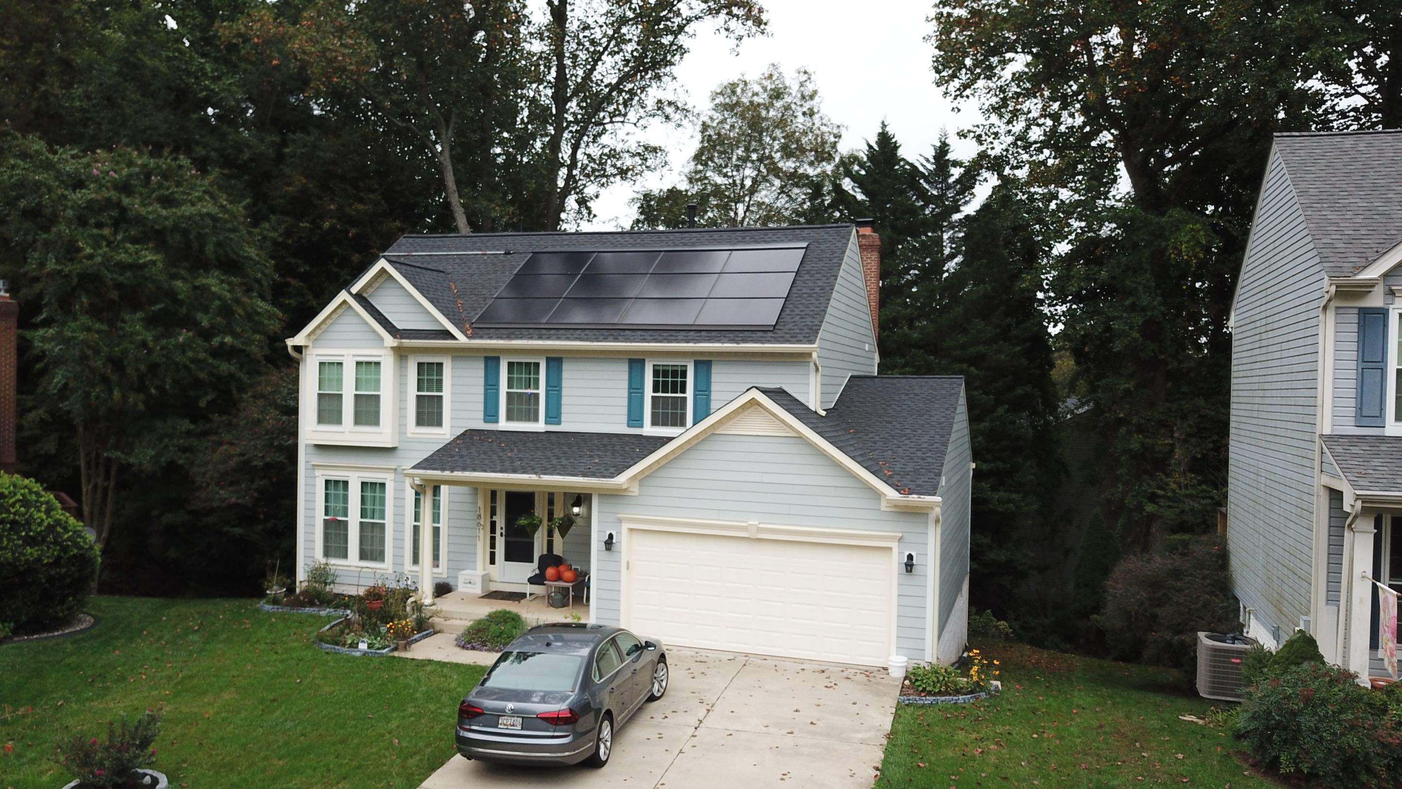 Exterior Home Makeover using GAF Timberline HDZ, GAF Decotech, and James Hardie Siding by American Home Contractors