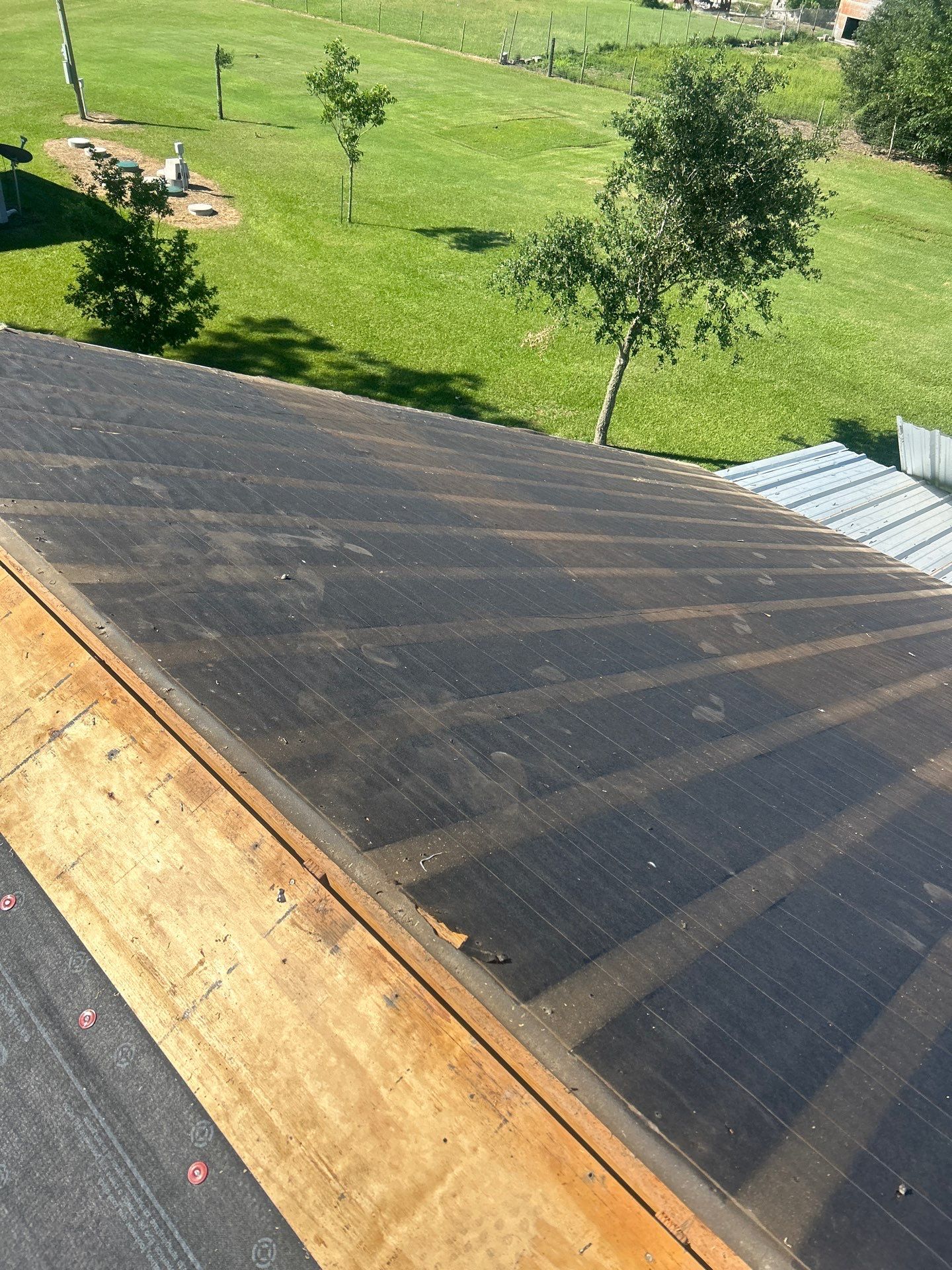 Residential Roofing Installation using Metal by Roof Repair Company