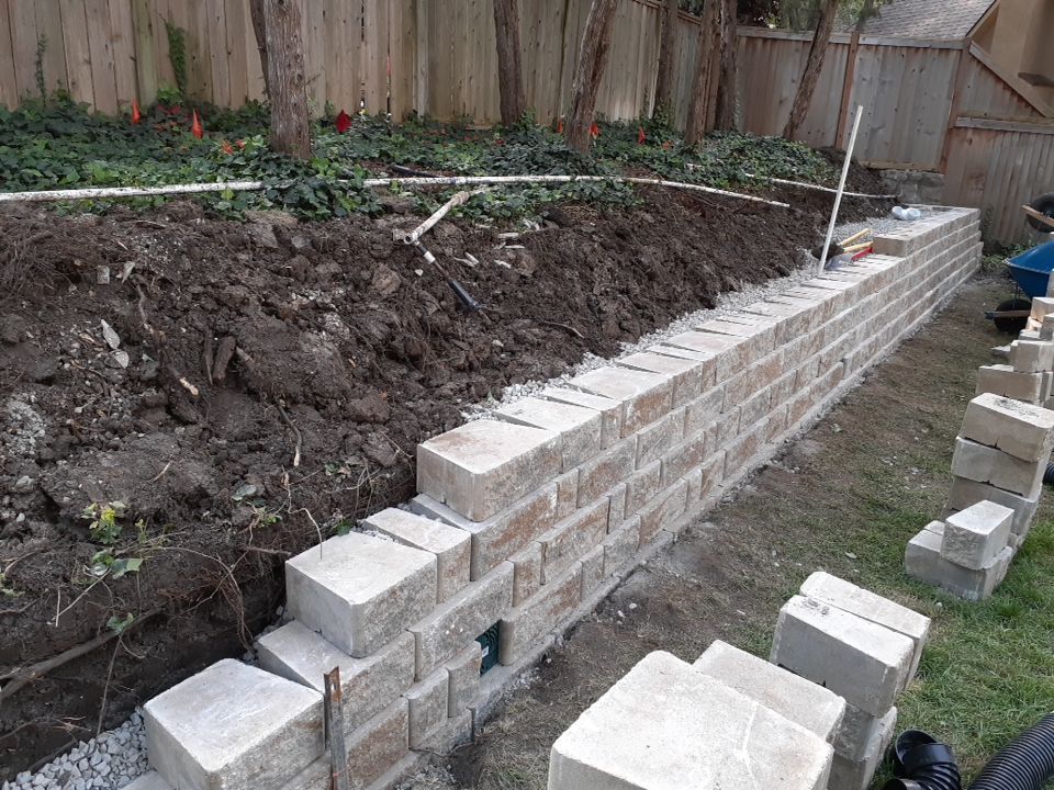 Back Yard Harington Retaining Wall by LAND ESCAPES LLC