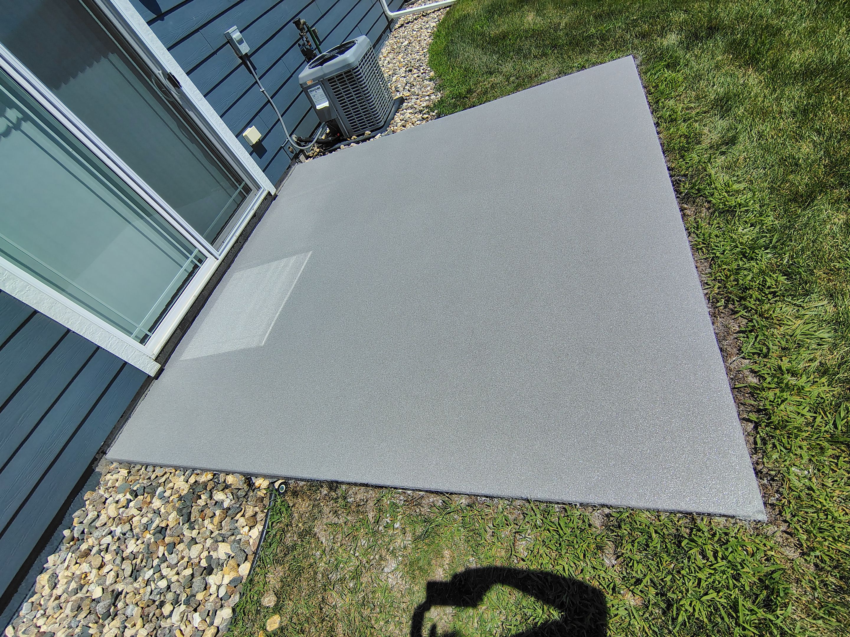 Custom Epoxy Garage Floor and Patio Coating in Sioux Falls by Select Painting, Coatings & Garage Cabinets