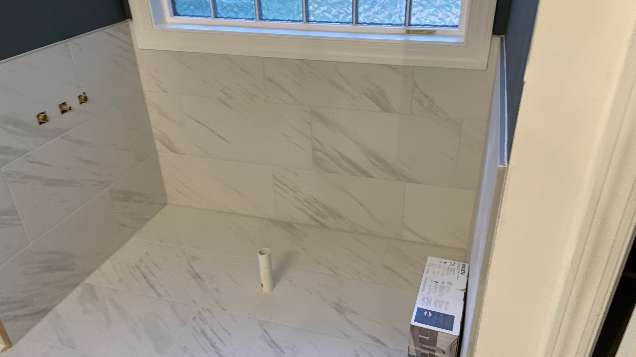 Bright Bathroom Remodel with Wall Removal, Stand Alone Tub and New Vanity by Footprints Floors of Coastal Carolina