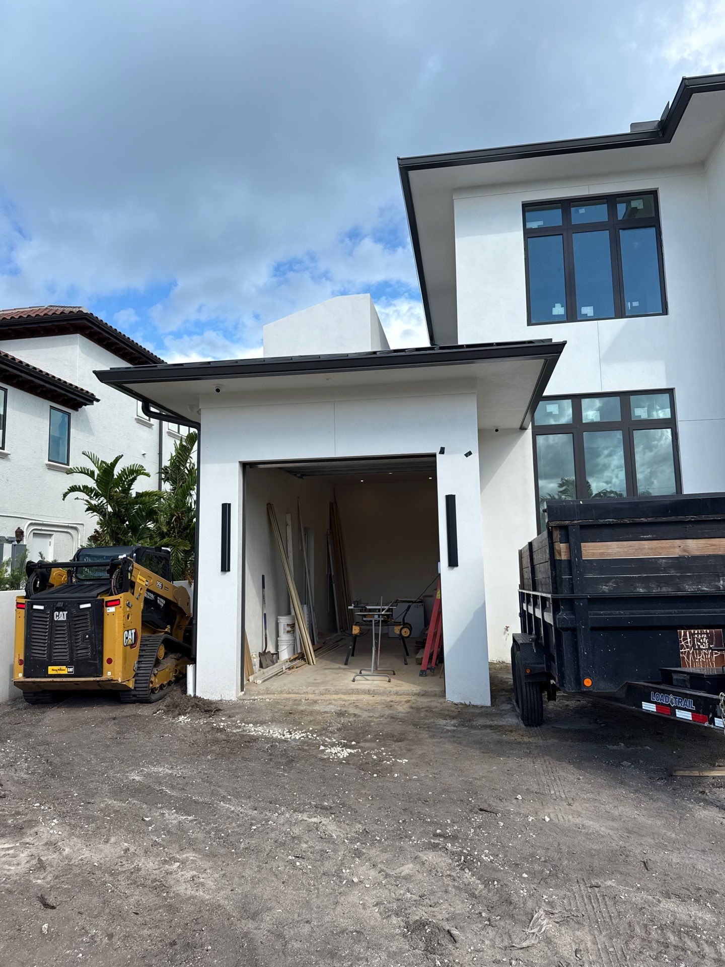 Seamless Aluminum Gutter Installation using black seamless gutters in Sarasota FL by Gutter Professors