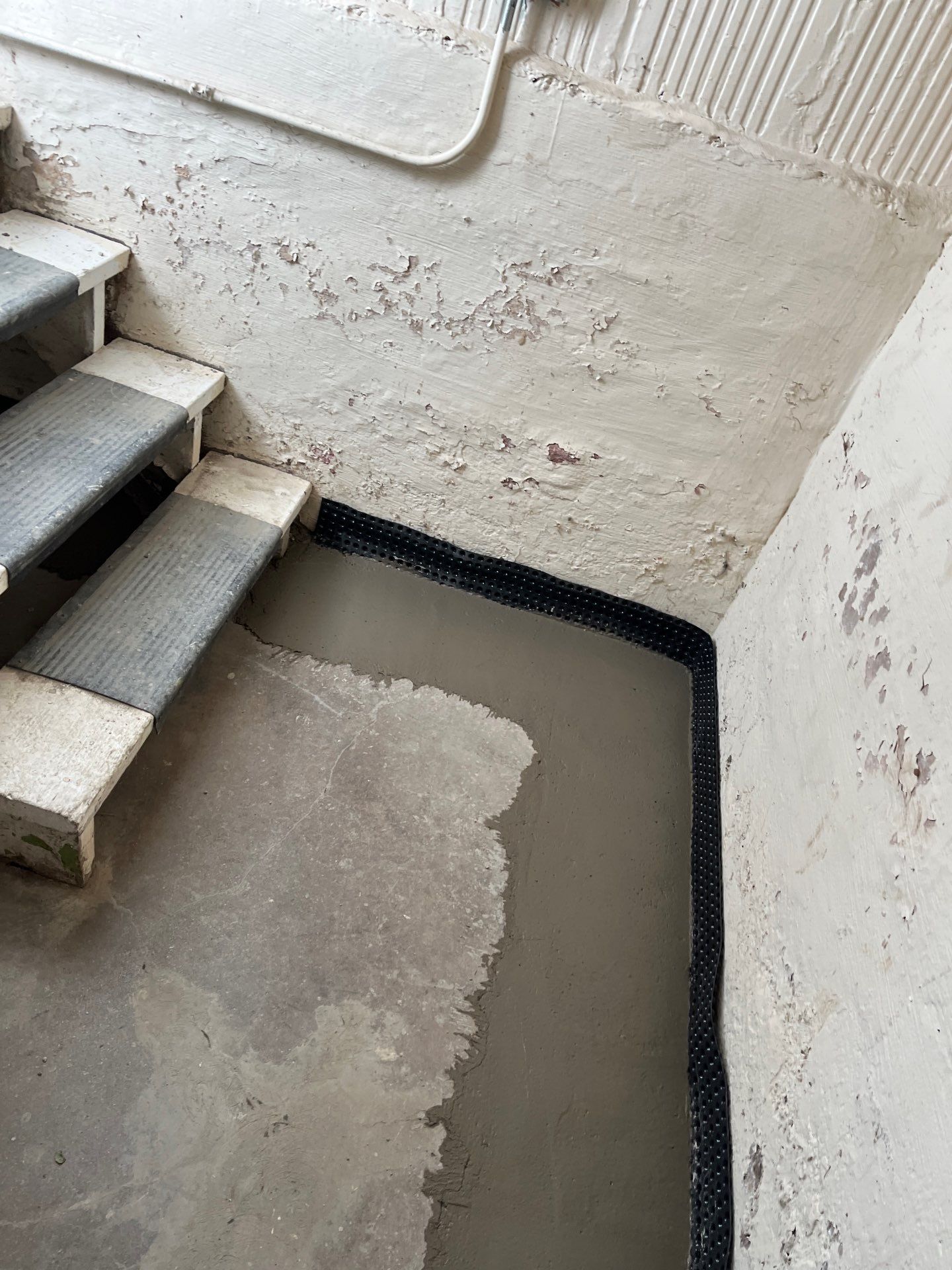 Berwyn- Interior Drain Tile System by Area Wide Waterproofing