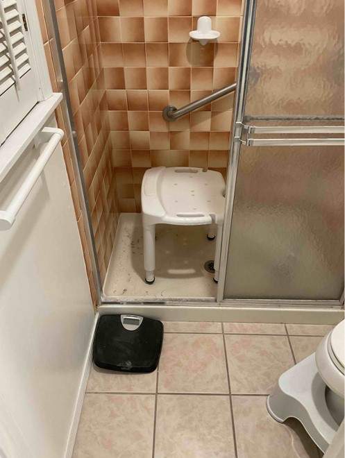 New shower, flooring, and countertop by The Shower Company