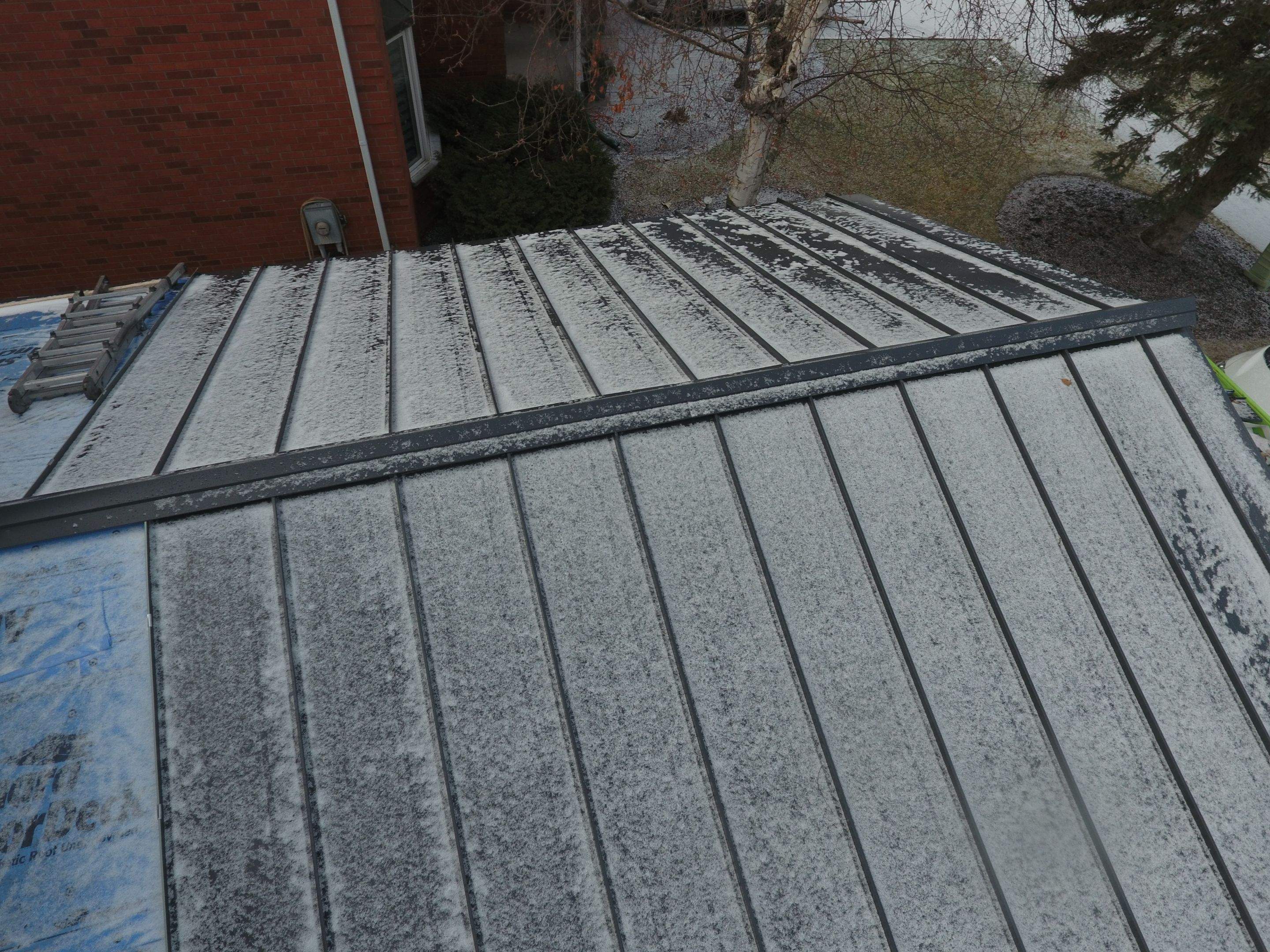 Roof Replacement using 16" Standing Seam Panels by Jay Carter Roofing & Sheet Metal