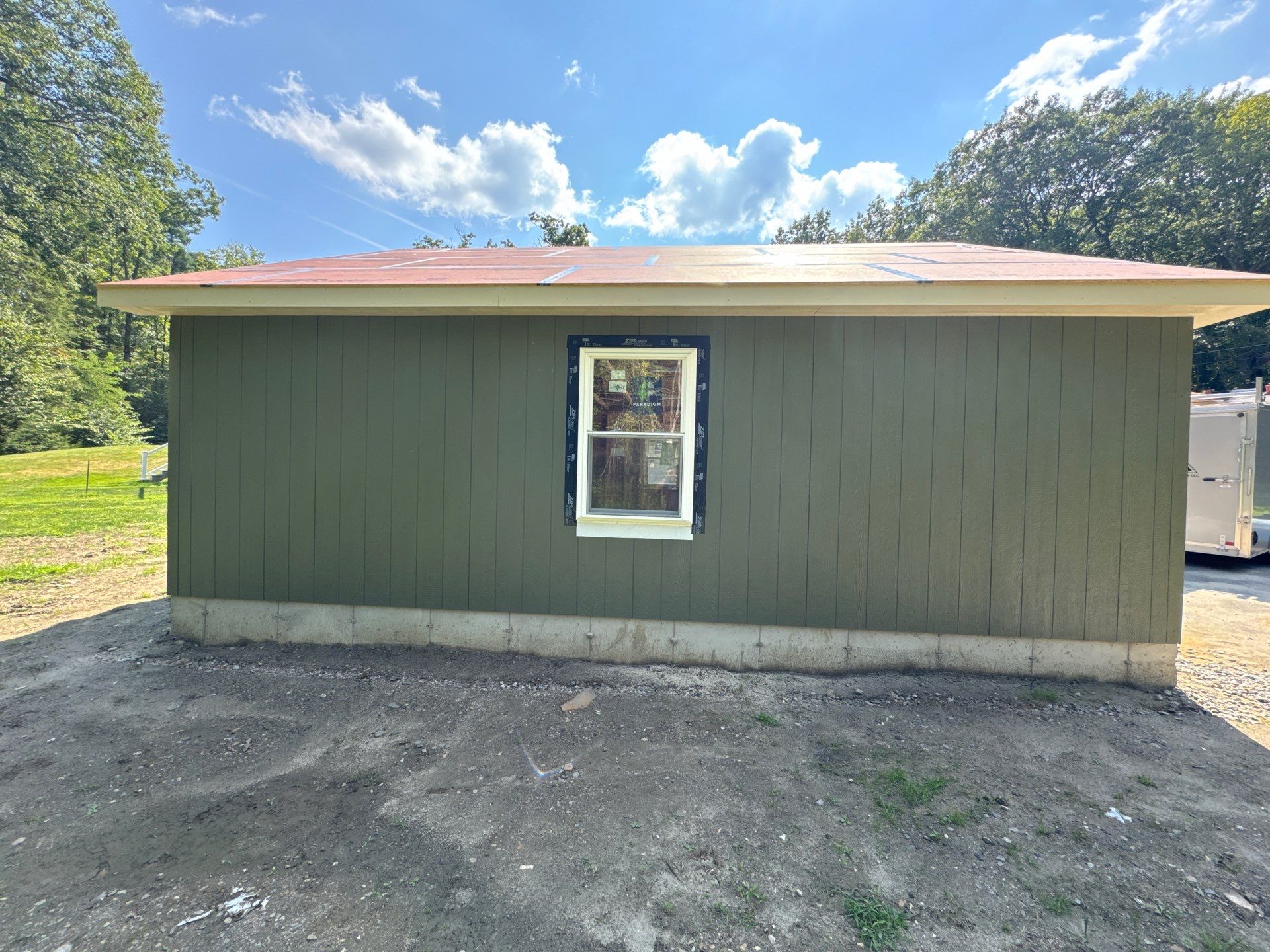 Two-Car Garage using LP SmartSide Panel Siding by Chagnon Building & Remodeling LLC