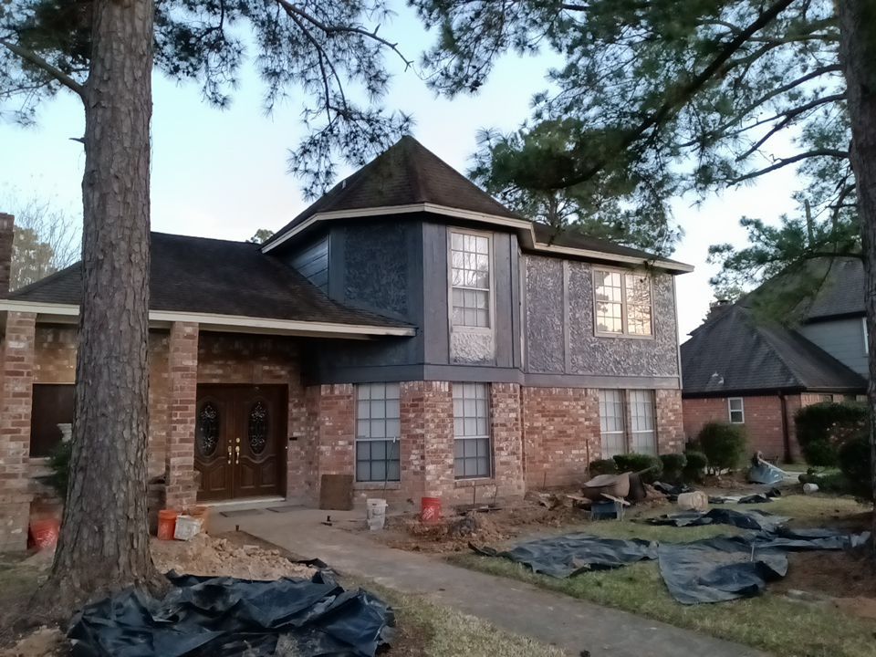Interior and exterior painting project by Roof Concepts Construction