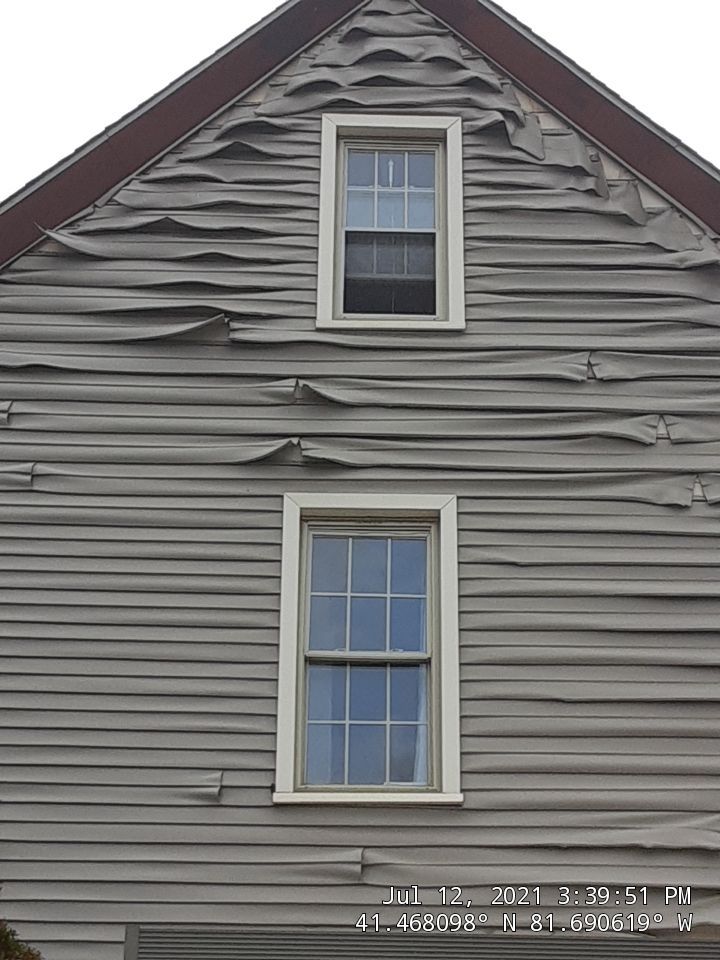 Fire damaged home in Tremont by Absolute Roofing and Construction