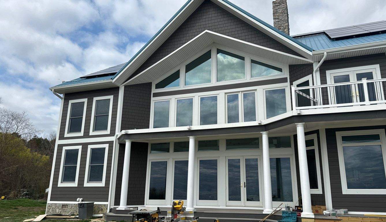 Siding Installation using JH Cedar Mill Plank by ExteriorPros