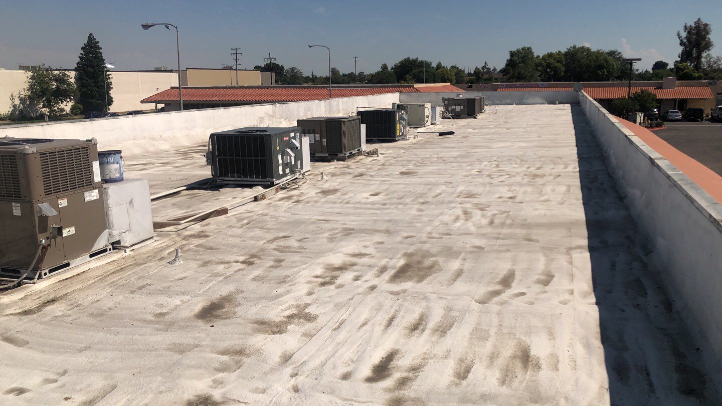 Reburbish existing spray foam job by Straight Edge Roofing Inc