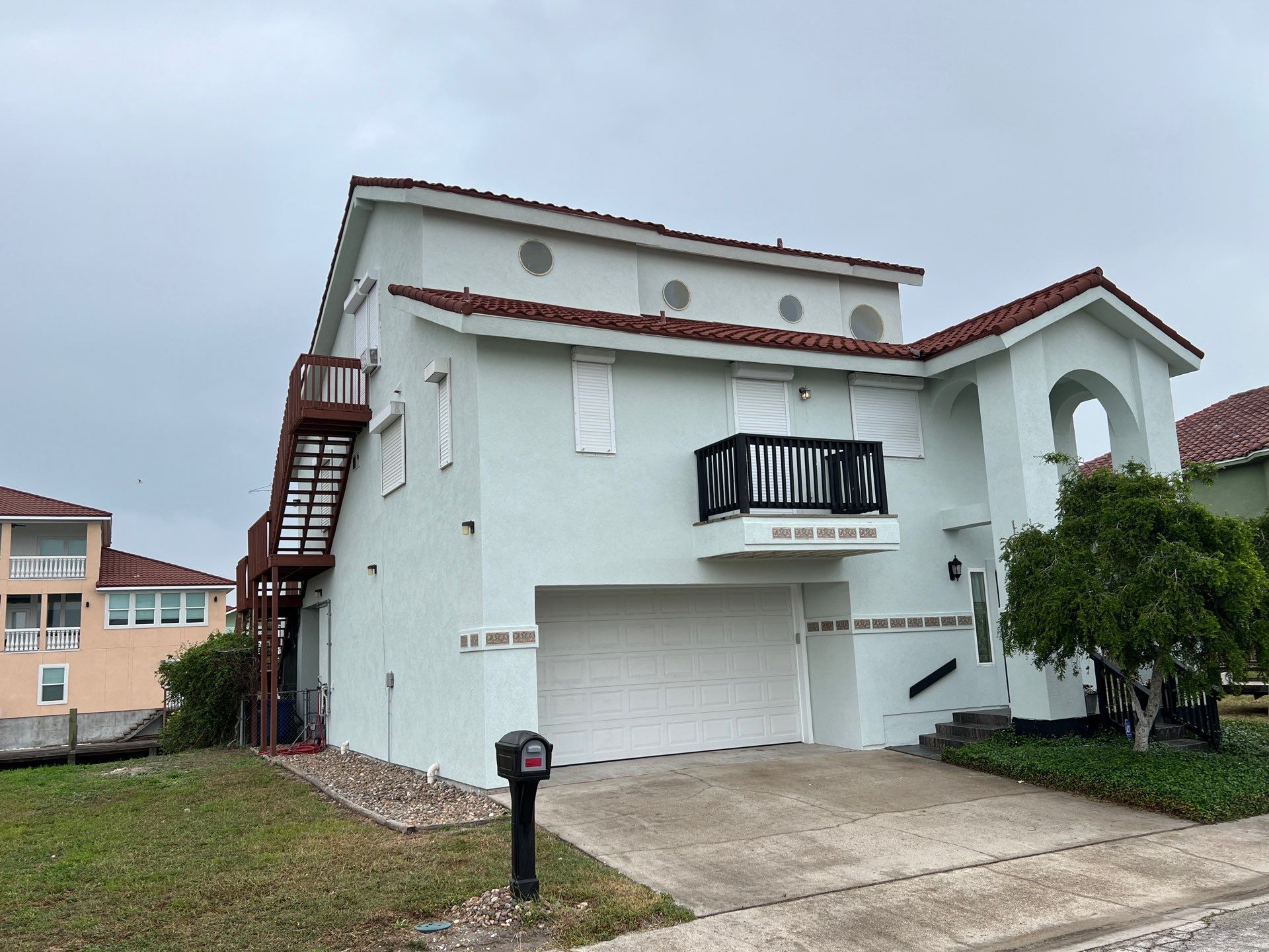 Waterfront Stucco Remastered by Bayfront Roofing and Construction