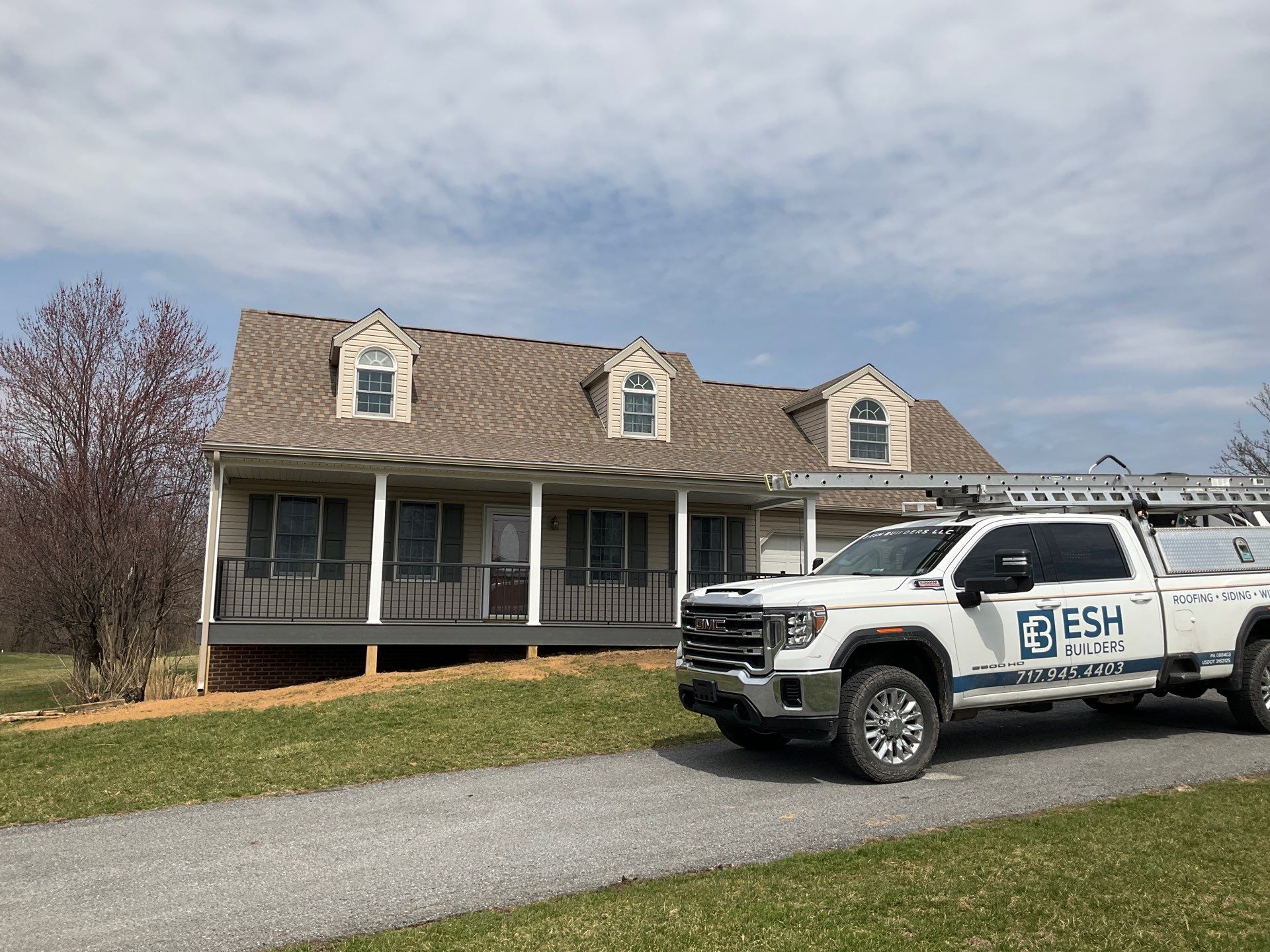 Custom Porch Roof Addition and Siding Renovation in Myerstown, PA by Esh Builders