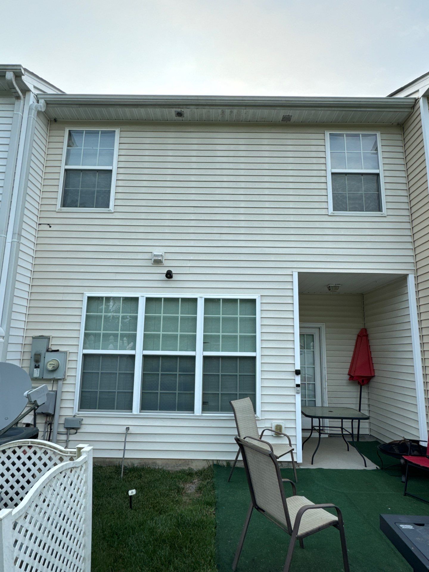 exterior house cleaning including vinyl siding windows and possibly concrete surfaces