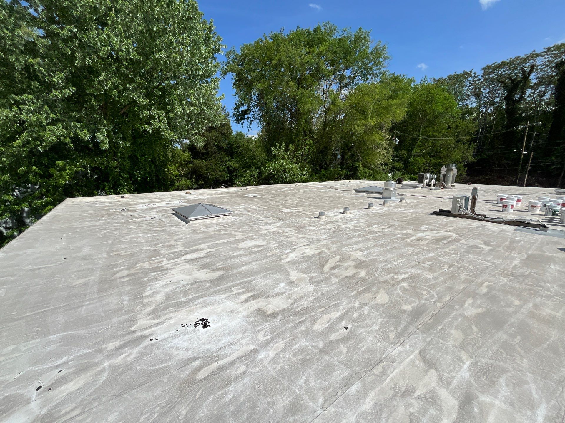 Commercial Roof using GACO Flex Silicone EPDM by ExteriorPros